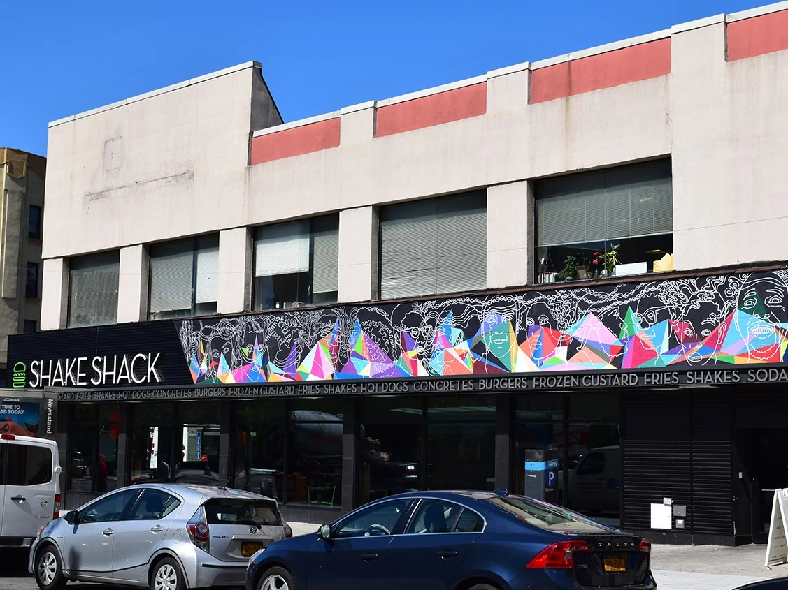 On the corner: Double Vision is located on one of the busiest corners of New York City at the intersection of 125th Street and and 5th Avenue, just north of Marcus Garvey Park.