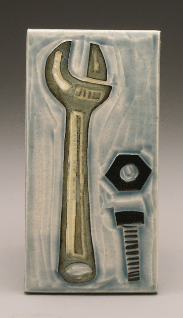   crescent wrench , 3 x 6 tile 