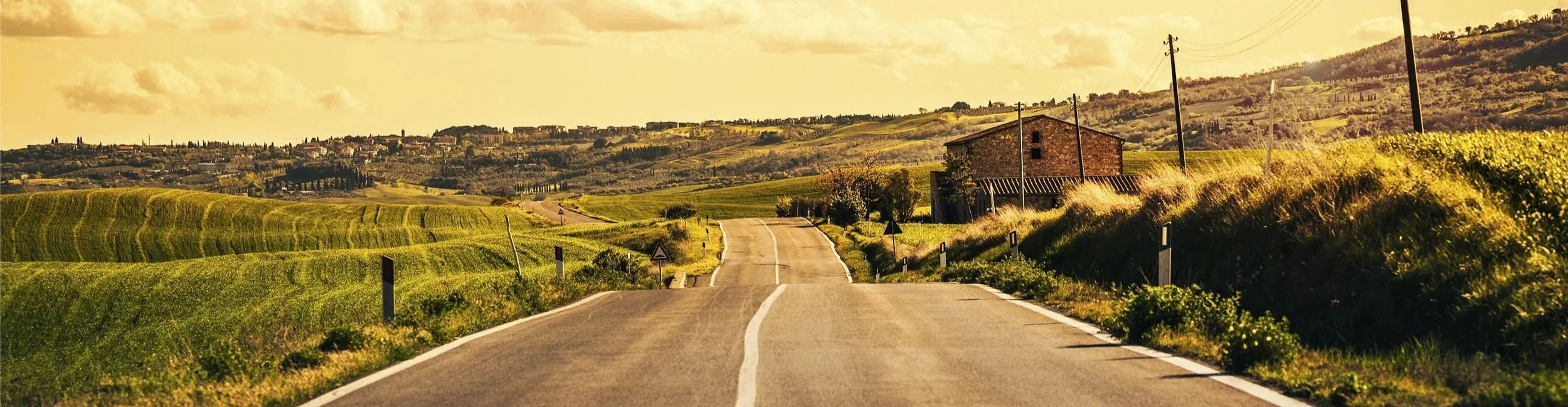 iStock_RoadthroughtheFields_StockImageLarge.jpg