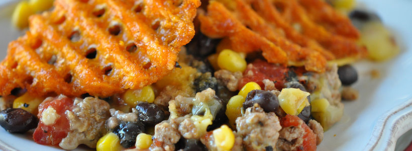 SOUTHWESTERN BEEF CASSEROLE WITH SWEET POTATO WAFFLE FRIES TOPPING