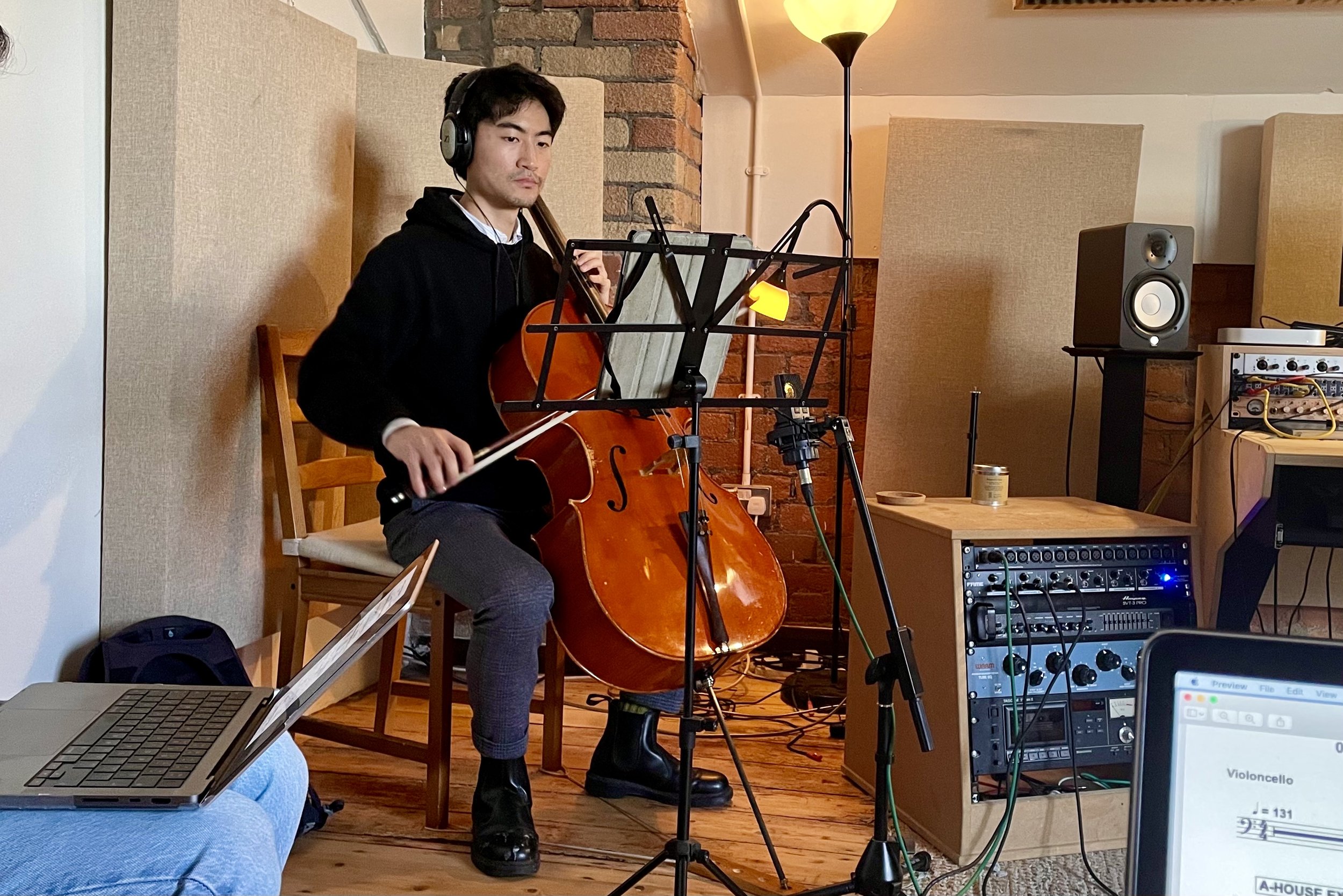 Akito Goto recording Cello for Passenger