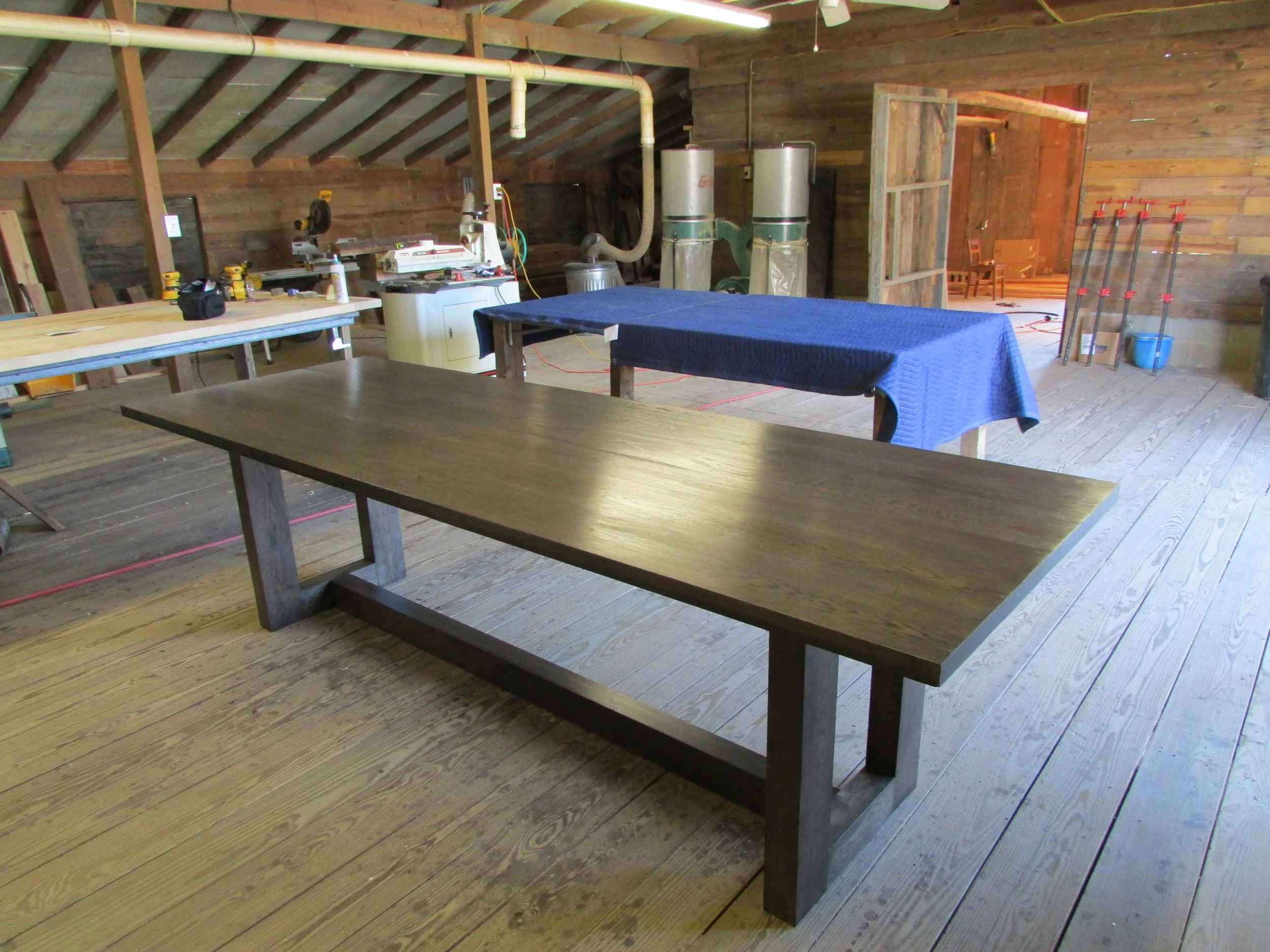 A dining table ready to leave the shop
