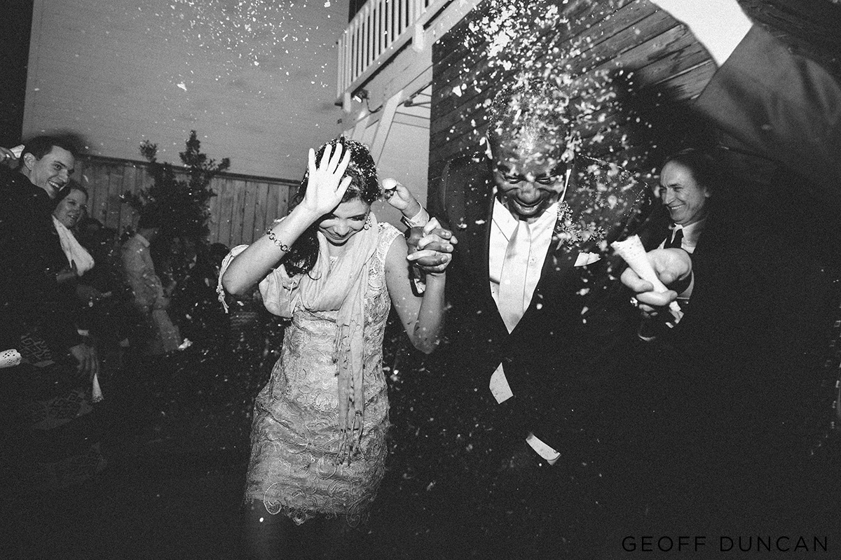 The bride and groom had an artificial snow exit