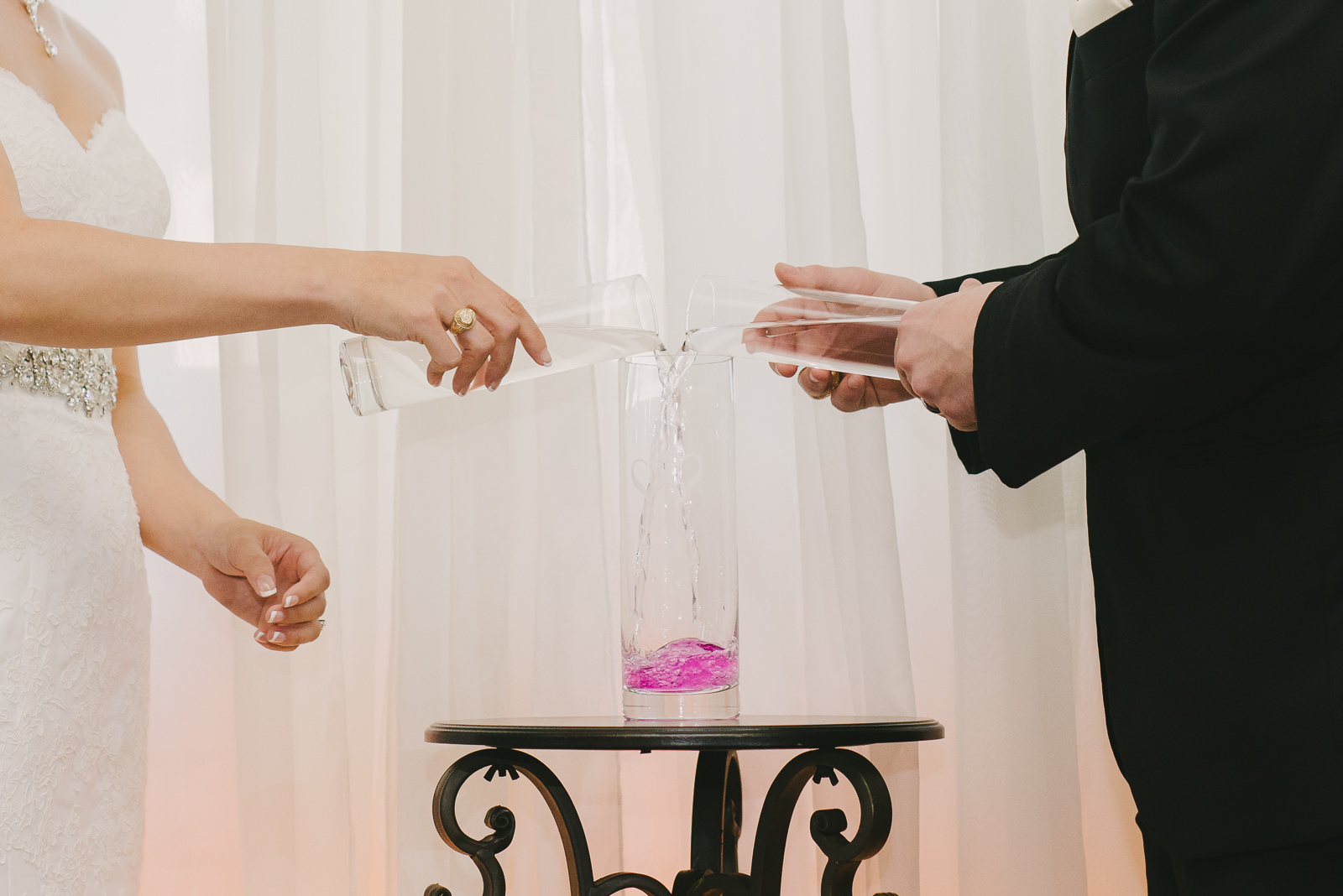 The couple did a water ceremony as a symbol of the two families becoming one. 