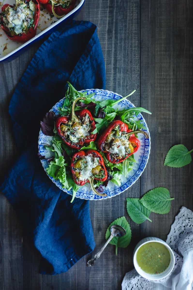 Stuffed red bell peppers with mushrooms, sweet plantains, zucchini and queso Manchego.