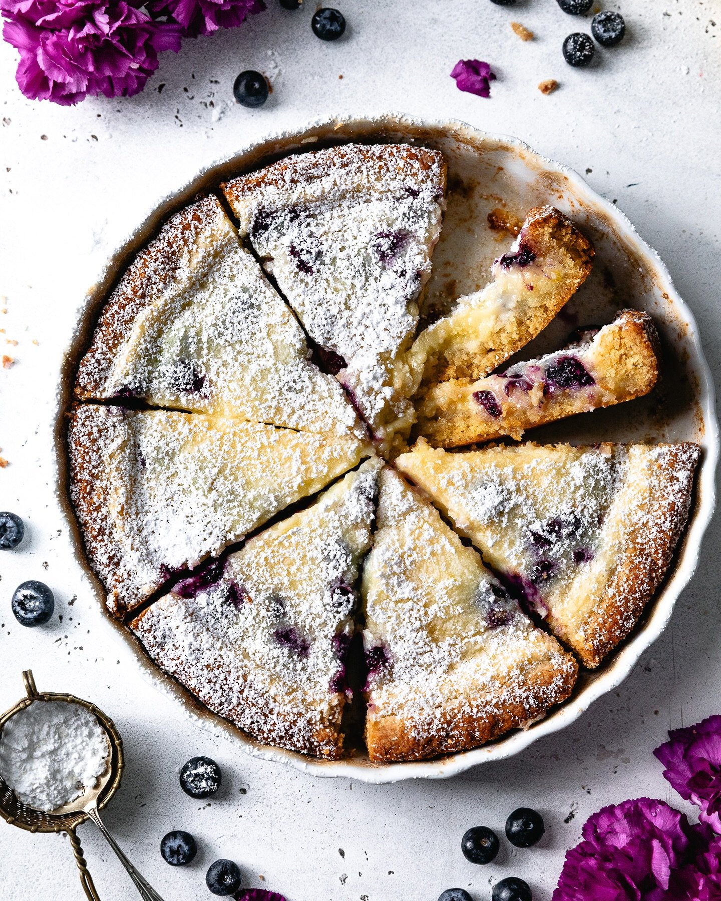 My Lemon Blueberry Gooey Butter Cake might be one of the most irresistible things you&rsquo;ll ever make! 🍋🫐 It starts with a buttery, gooey cake layer and then gets topped with an even gooier cream cheese layer 🫠 Both are loaded with fragrant lem