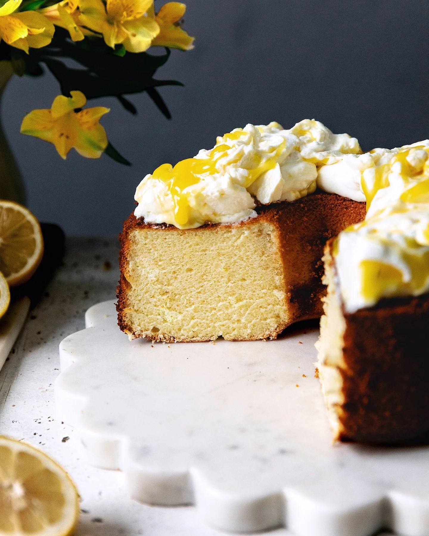 It&rsquo;s all about serious lemon business with this Lemon Chiffon Cake 🍋 So fluffy, light, and magical, full of zest and lemon flavor without being too sour-y, she&rsquo;s a total queen with that lemon curd whipped cream crown on top ✨ Just look a