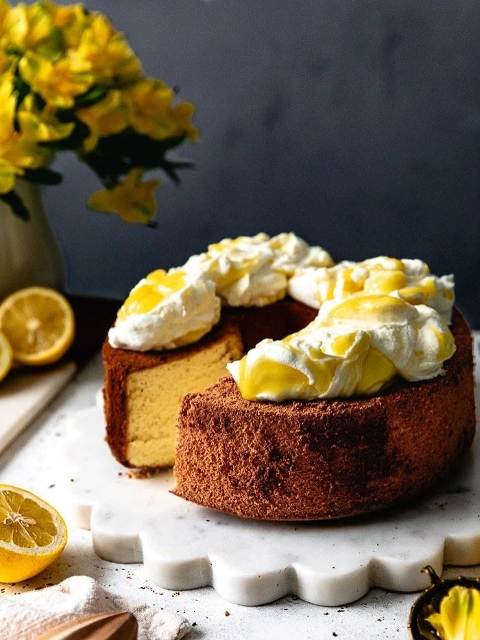 Happy Monday, Friends! You&rsquo;d never guess this Lemon Chiffon Cake is one of the easiest cakes to make! ☁️🍋 Tall, golden, and incredibly light, it has the softest cloud-like texture. I topped it with whipped cream folded with lemon curd for the 