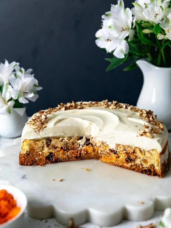 If you can&rsquo;t decide between carrot cake and cheesecake, this dessert gives you both! An ultra-moist, spice-filled carrot cake is swirled with a rich, creamy cheesecake filling and topped with fluffy whipped cream and toasted pecans. One bite an