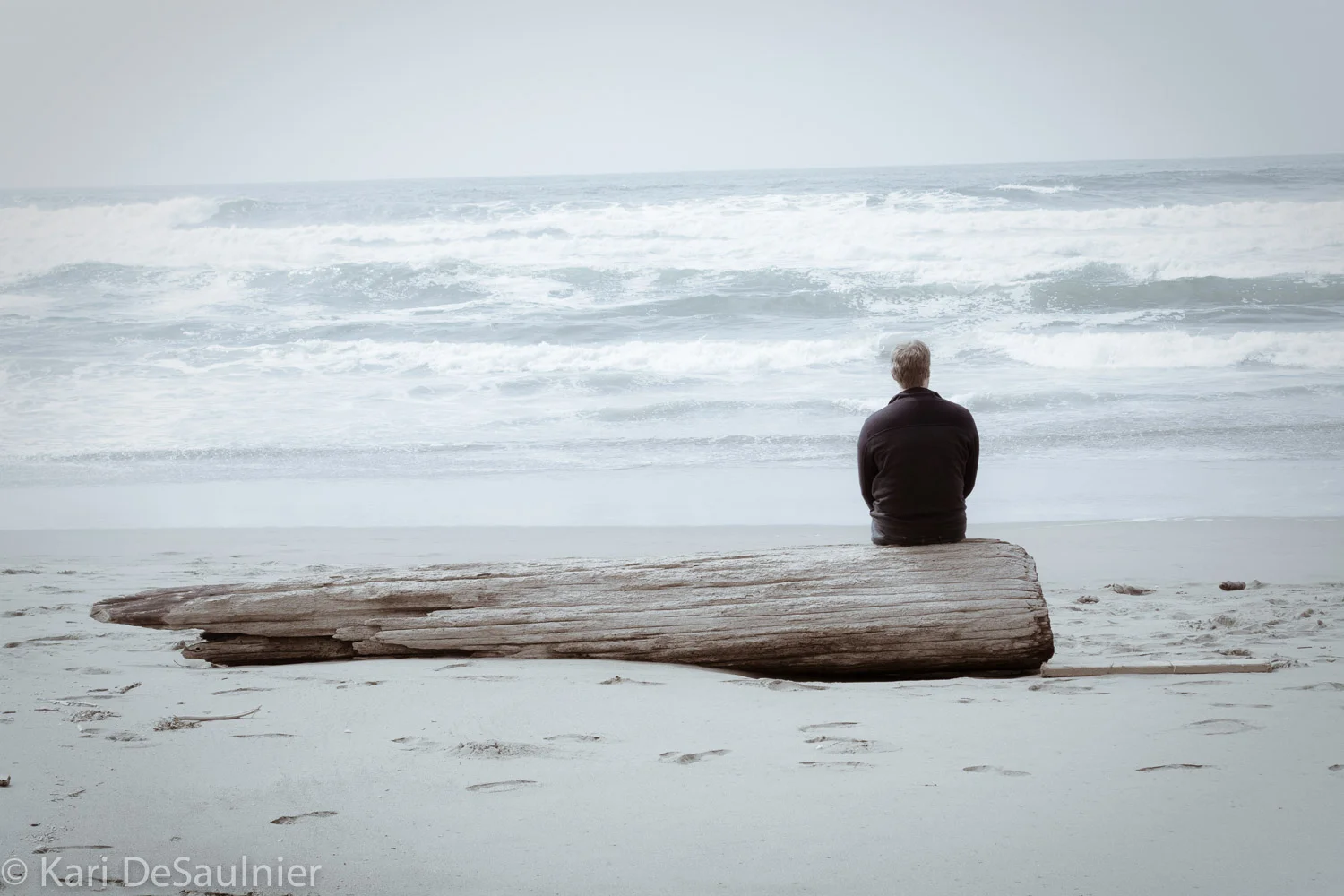 Mark enjoyed watching the waves coming in and going out.