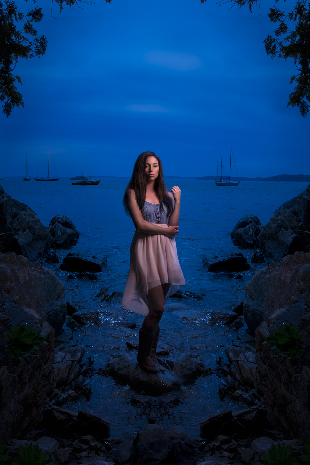 Breanna Mason on the coast of Maine at noon on a cloudy day.