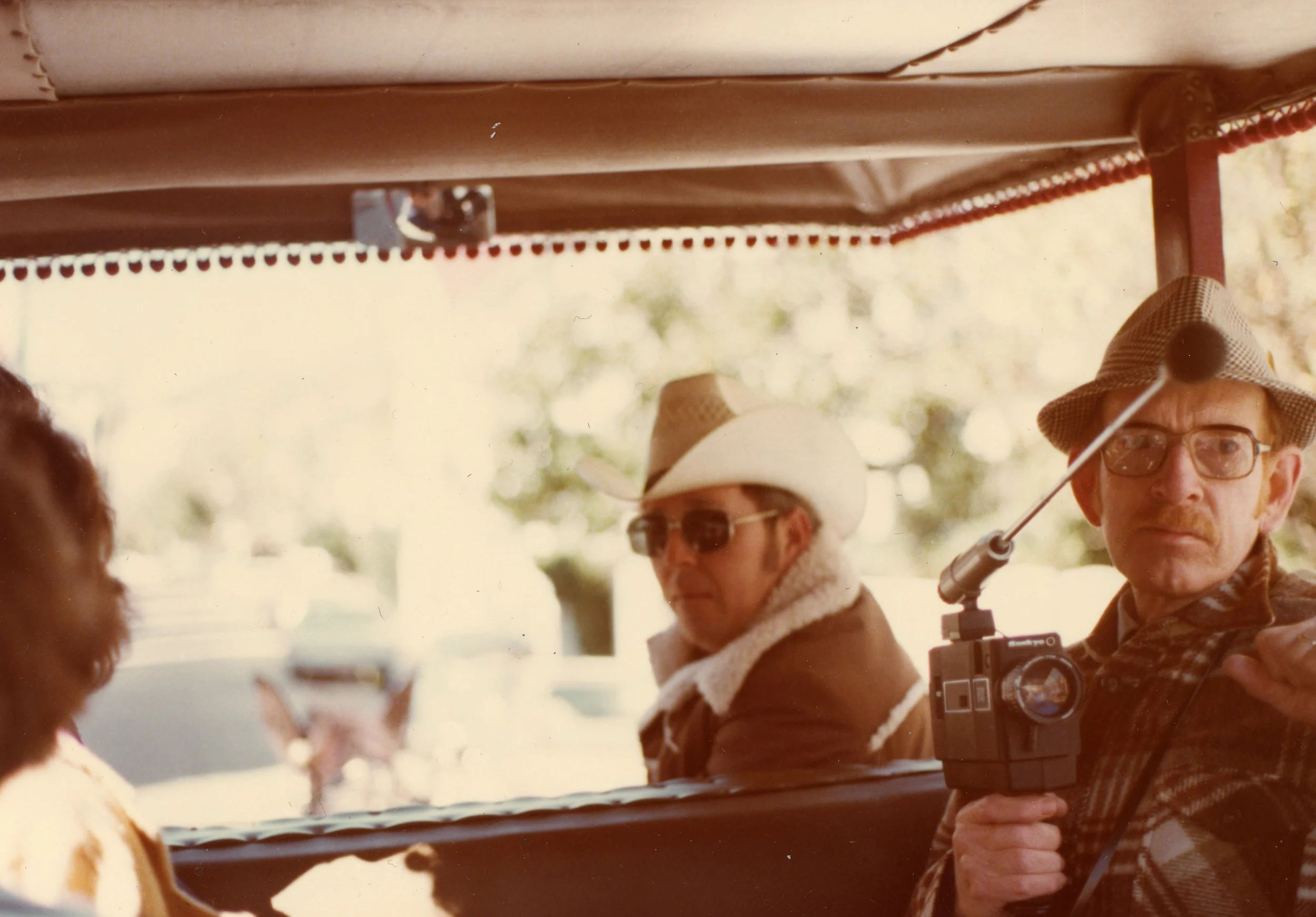 James Henry Kilgore, Jr, ca. Mid 1970’s, with his super-8 camera and mic, Charleston, South Carolina, awaiting a surrey tour.
