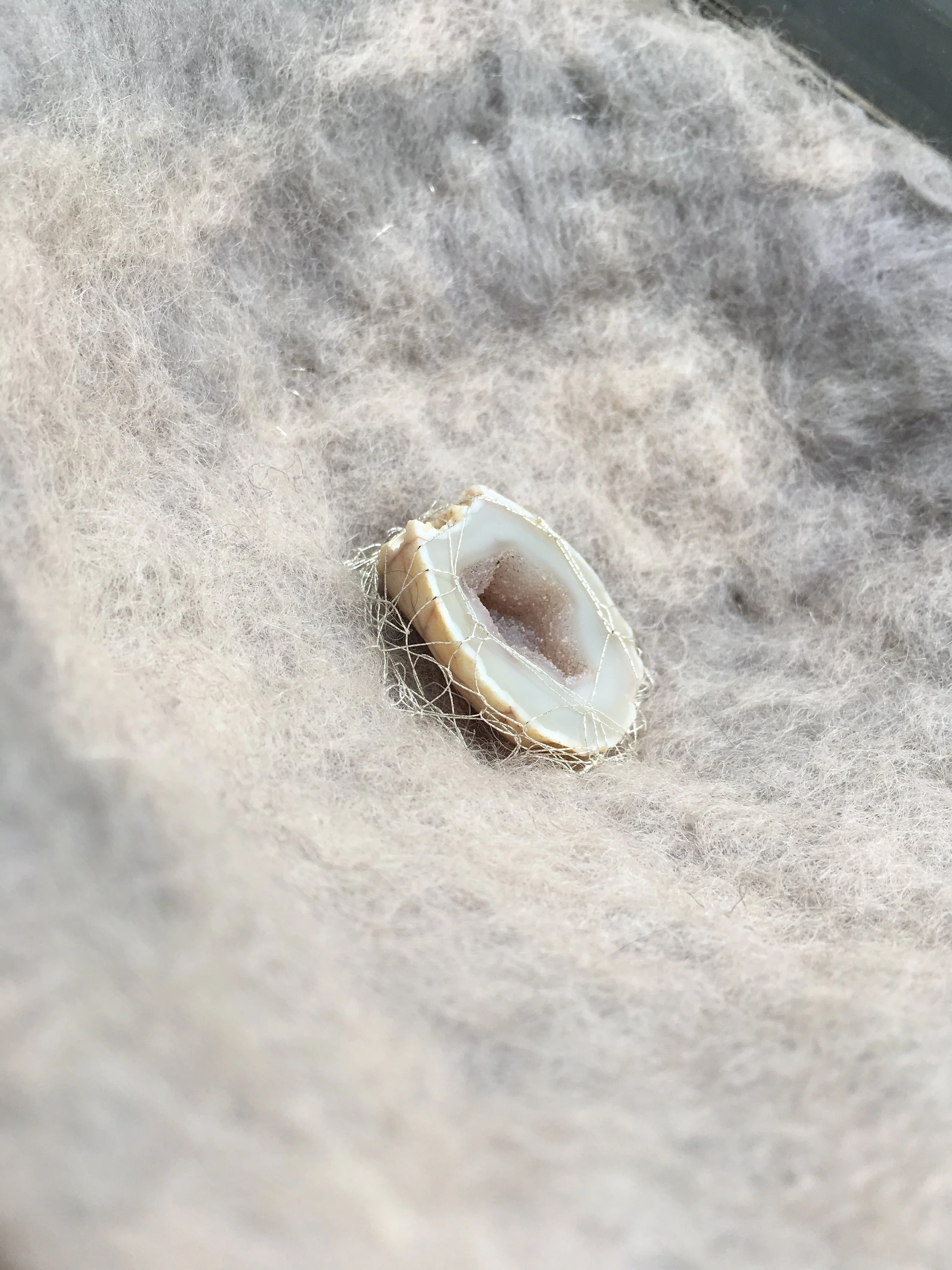 Felted vessel, fibers and minerals, 2018