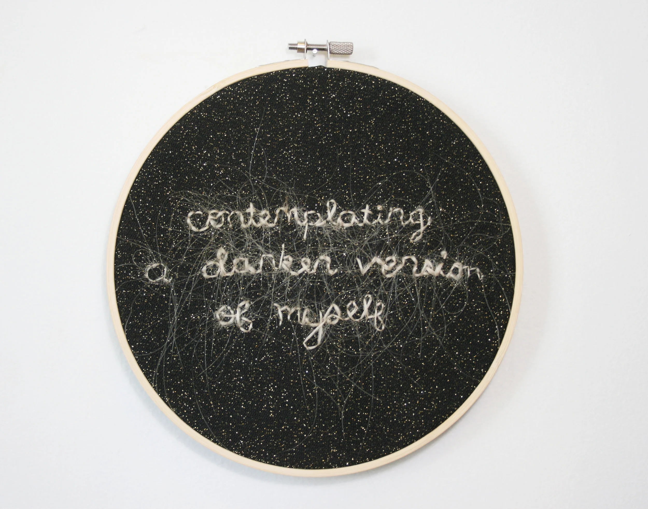 contemplating a darker version of myself, human hair embroidered on linen and nylon, 2016