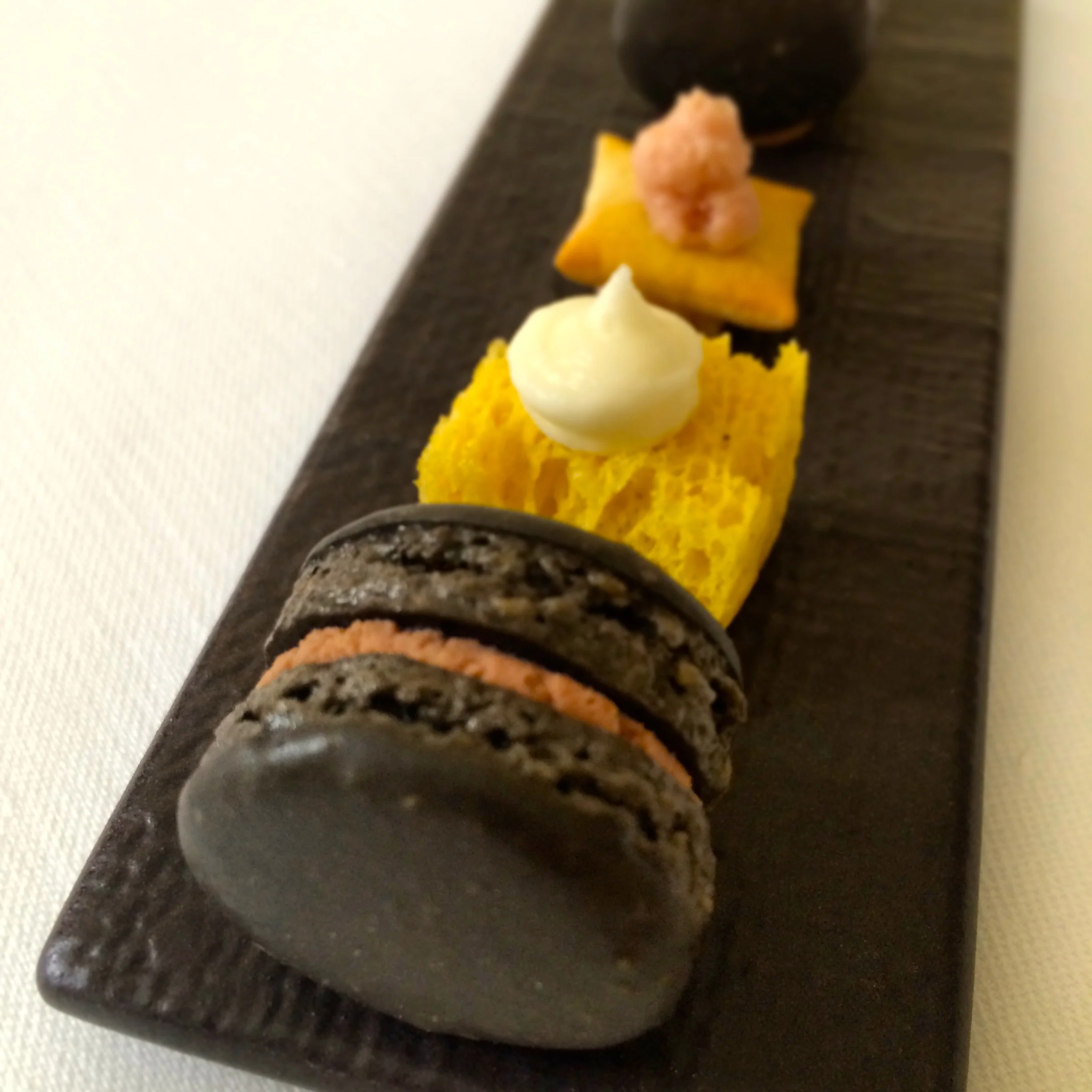 Truffle macaron w/ chicken liver; bleu cheese mousse; mortadella cracker