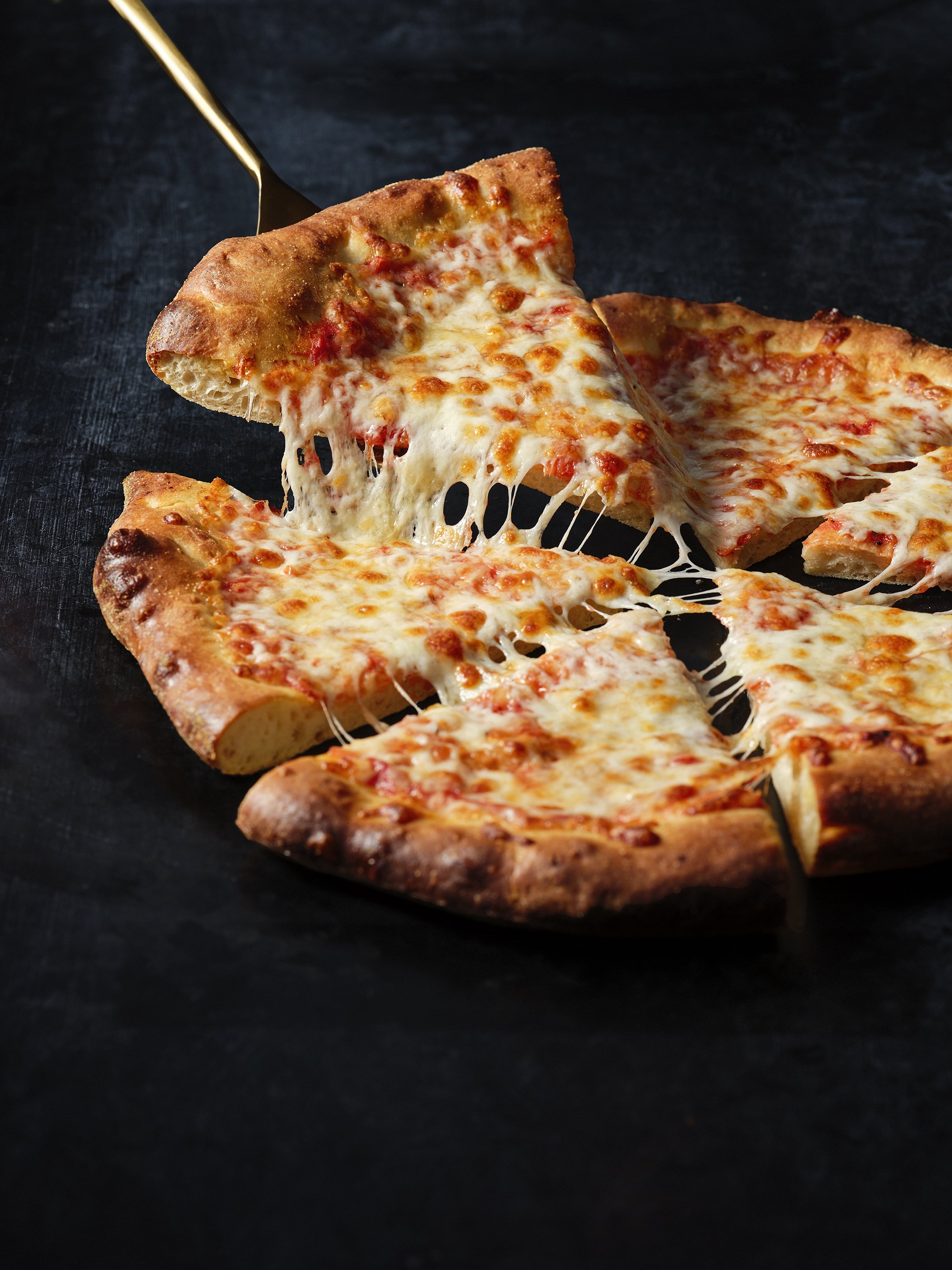 Franco food pizza pieces on dark background 240314shot01- 8.jpg