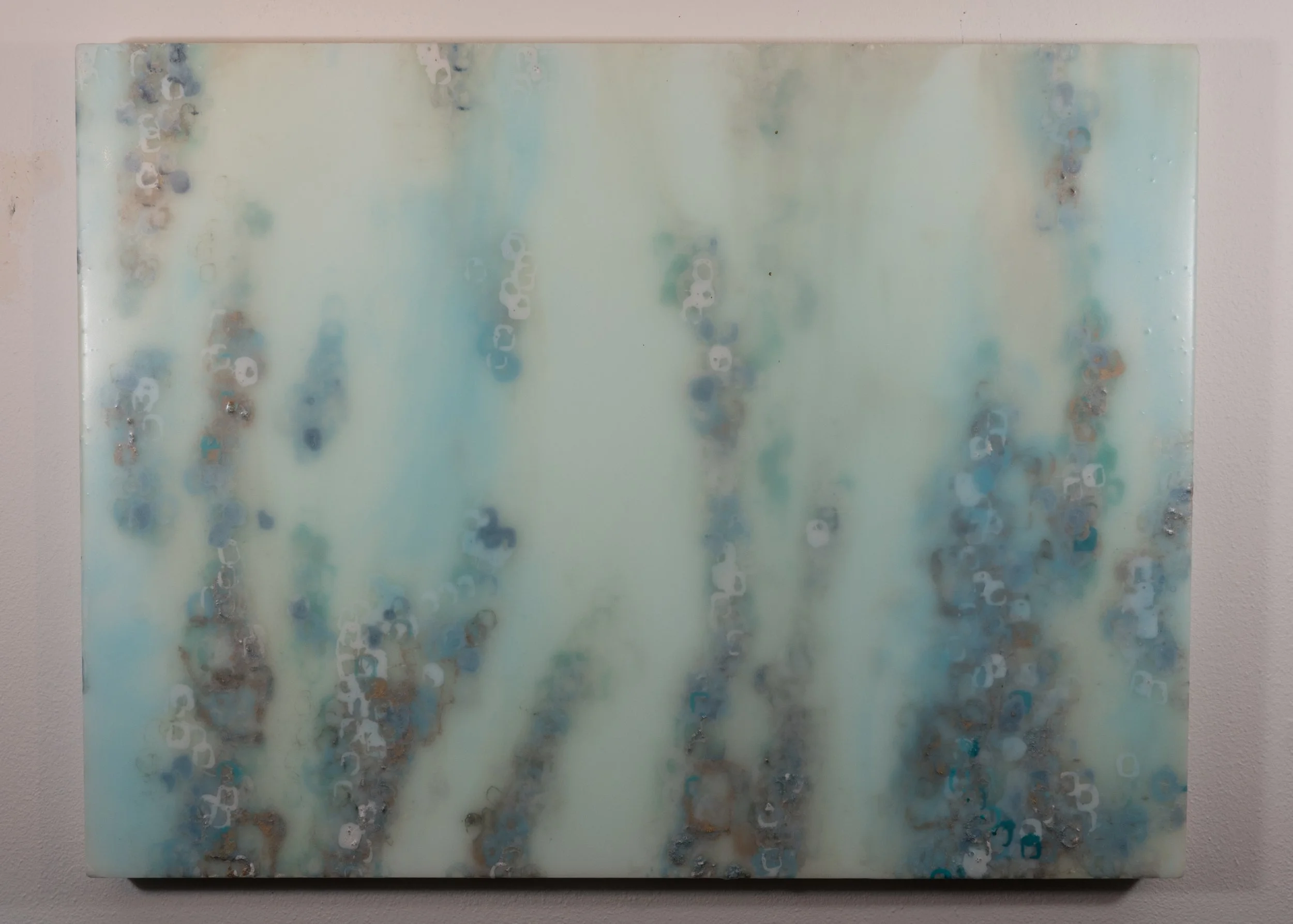 Abstract painting with soft light blue, white, gray, and hints of brown and darker blue colors with a textured appearance.