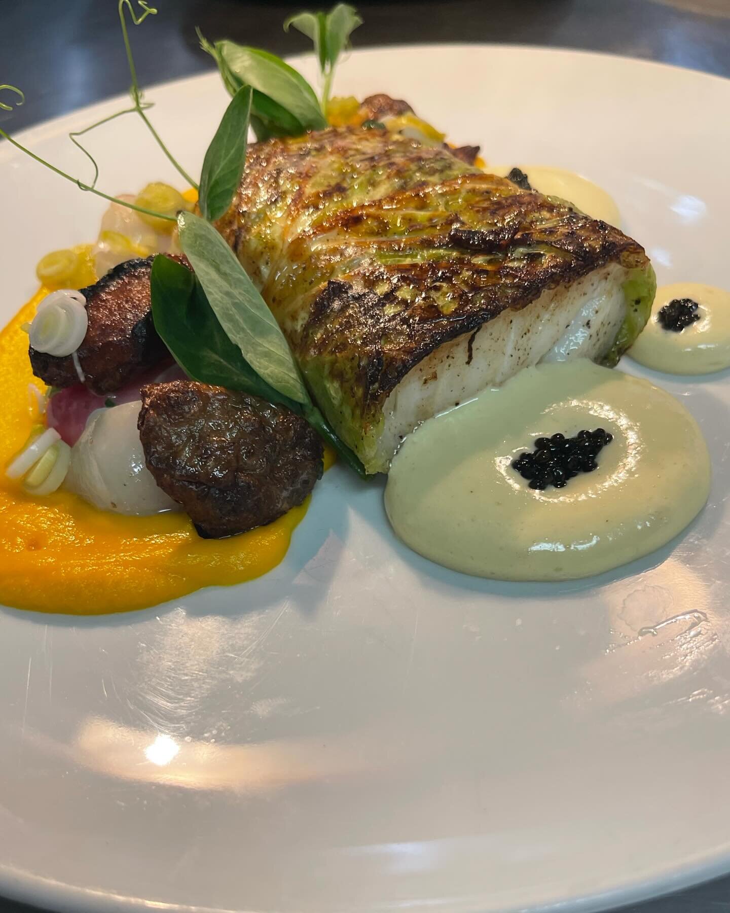 Savoy Cabbage Wrapped Icelandic Cod: Brown Butter Roasted, Nantes Carrot Puree, French Breakfast Radish, Turnip, Sunchoke, Pickled Green Garlic, Pea Tendril, White Sturgeon Caviar and Brown Butter Velout&eacute; Espuma. #bestseatsintown #since1944 #r