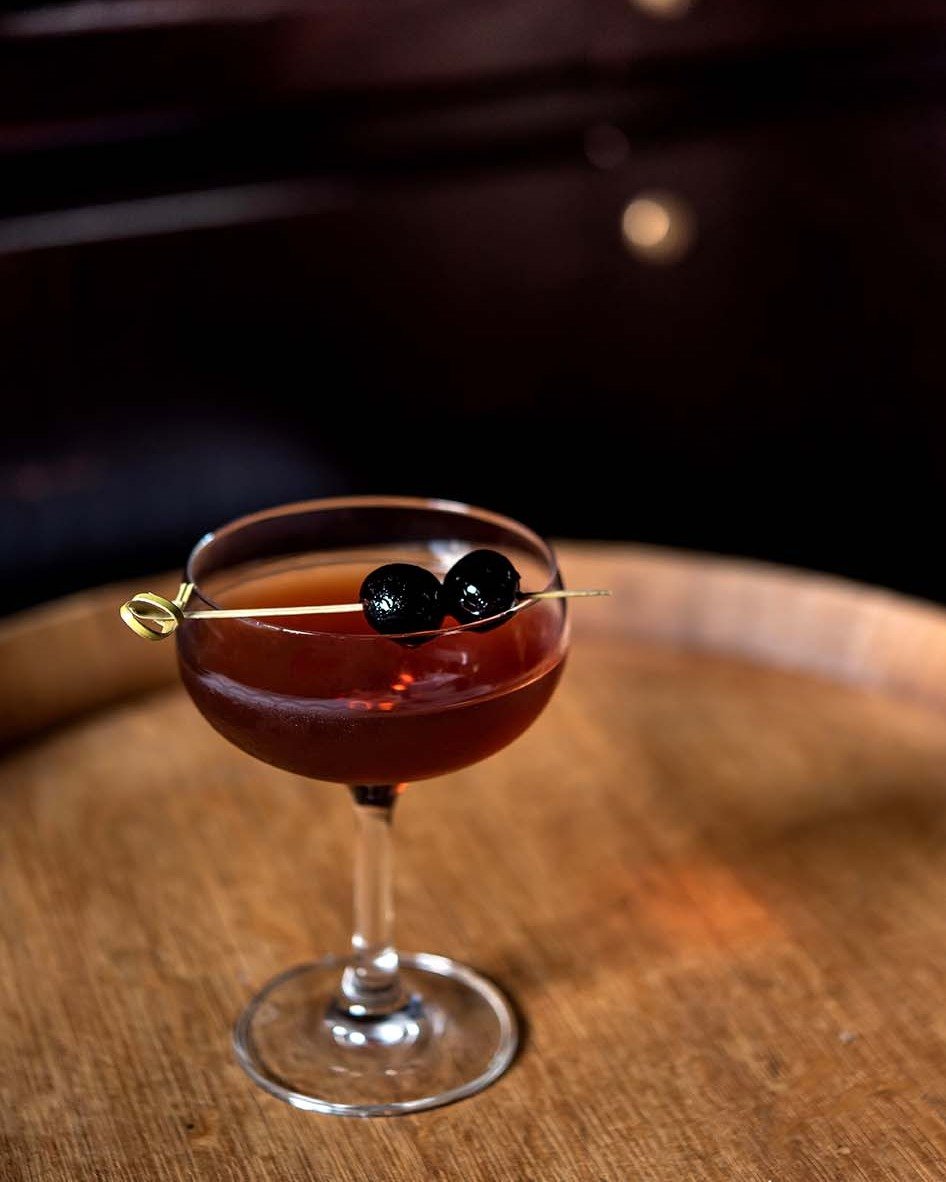 Our Manhattan features a few choice ingredients carefully chosen by our team.  A Single Barrel Selection exclusive to RingSide of @Heaven Hill Distillery Rittenhouse Rye for the base, Dolin Rouge Vermouth for balance, a touch of Fonseca Bin 27 Ruby P