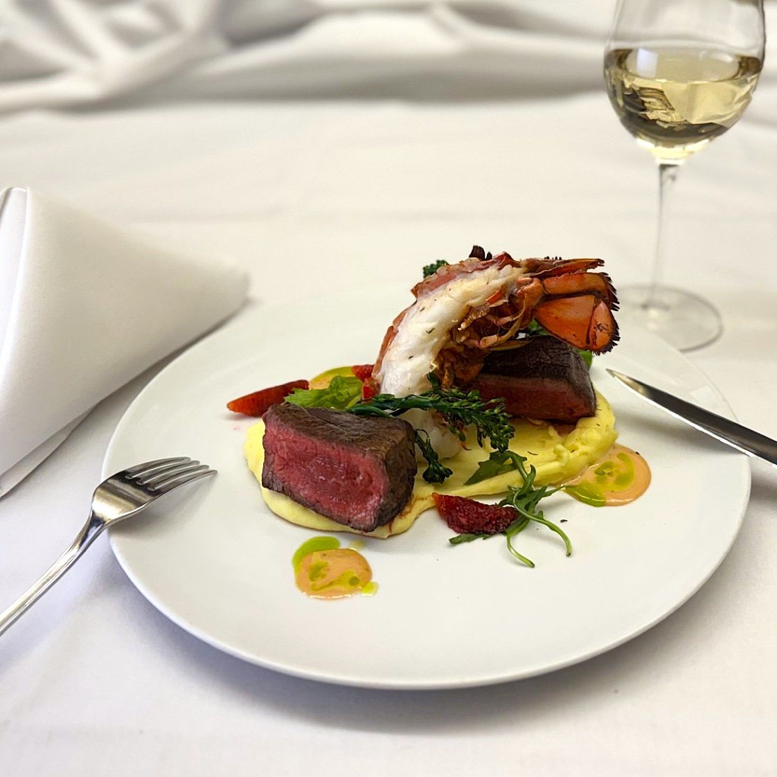 We look forward to ringing in the New Year with all of you this evening!  Our Chefs are pleased to offer the following to celebrate the New Year. 

Surf &amp; Turf: 8 oz. Prime Filet, 8 oz. Cold Water Lobster Tail, Blood Orange Beurre Blanc, Wagyu Ju