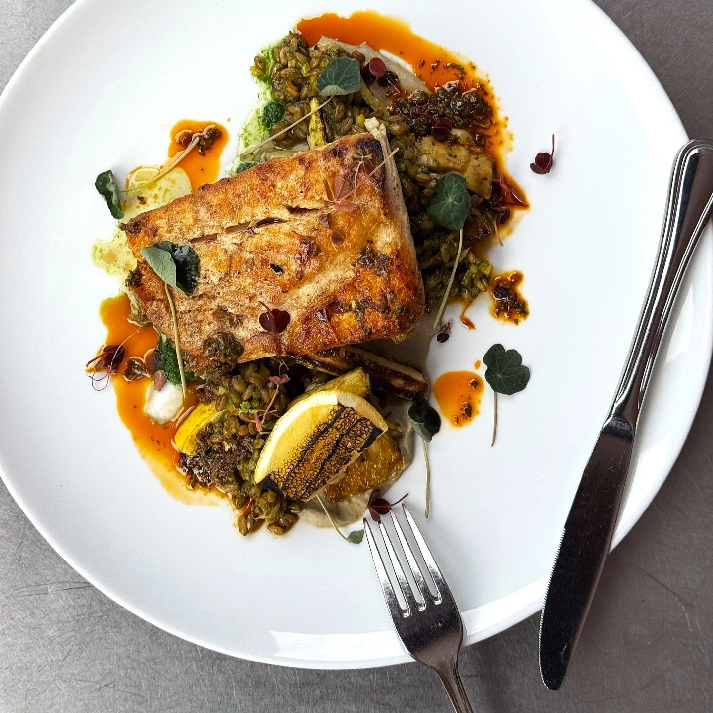 Spring has sprung and our Chefs are ready!  Halibut season is underway and ours is accompanied by spiced farro, preserved meyer lemon, roasted squash and zhoug all tied together with a  silky smoked eggplant pur&eacute;e.  See you soon!