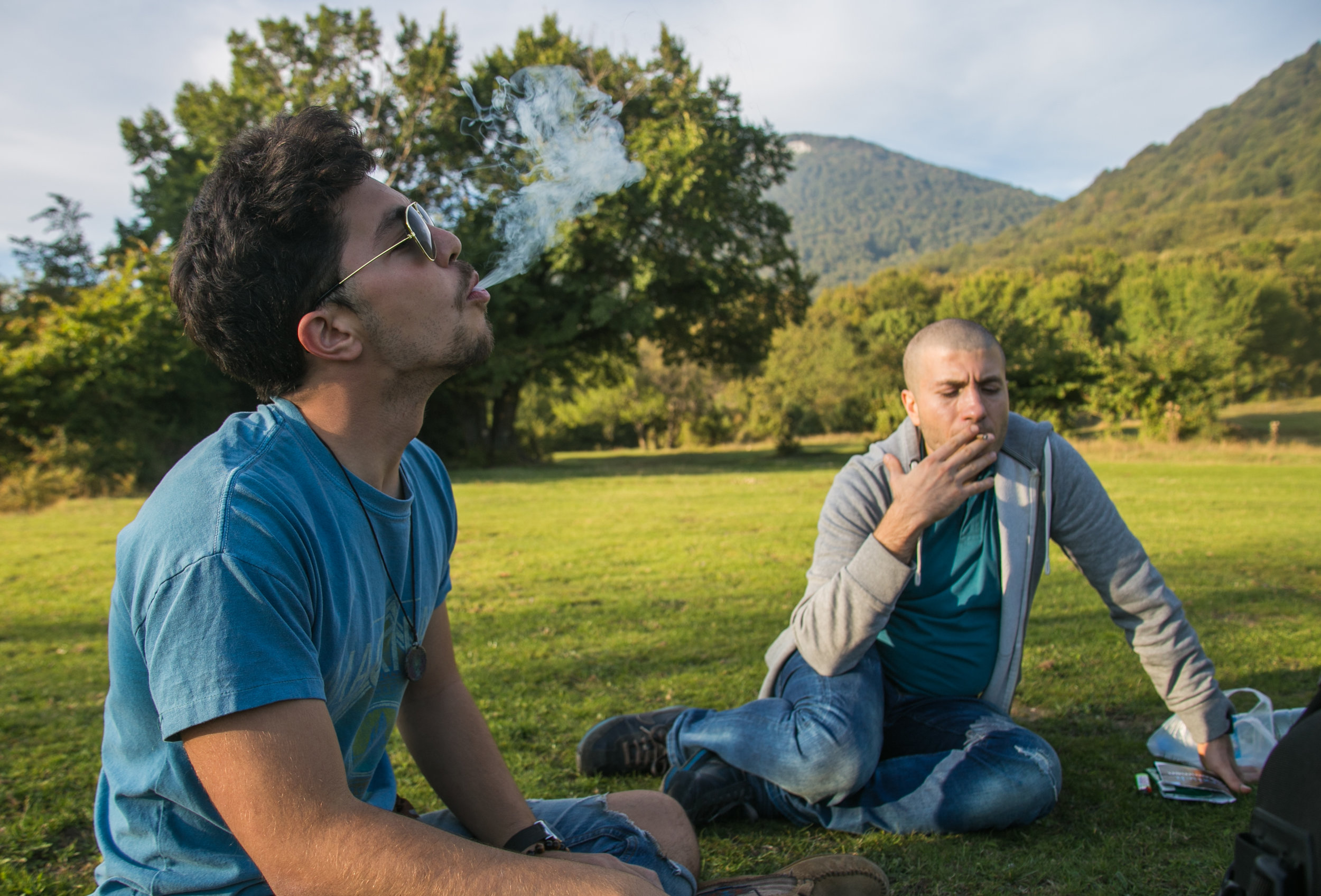  Marco and Mo smoking hand-rolled cigarettes atop Dajti Mountain.&nbsp; 