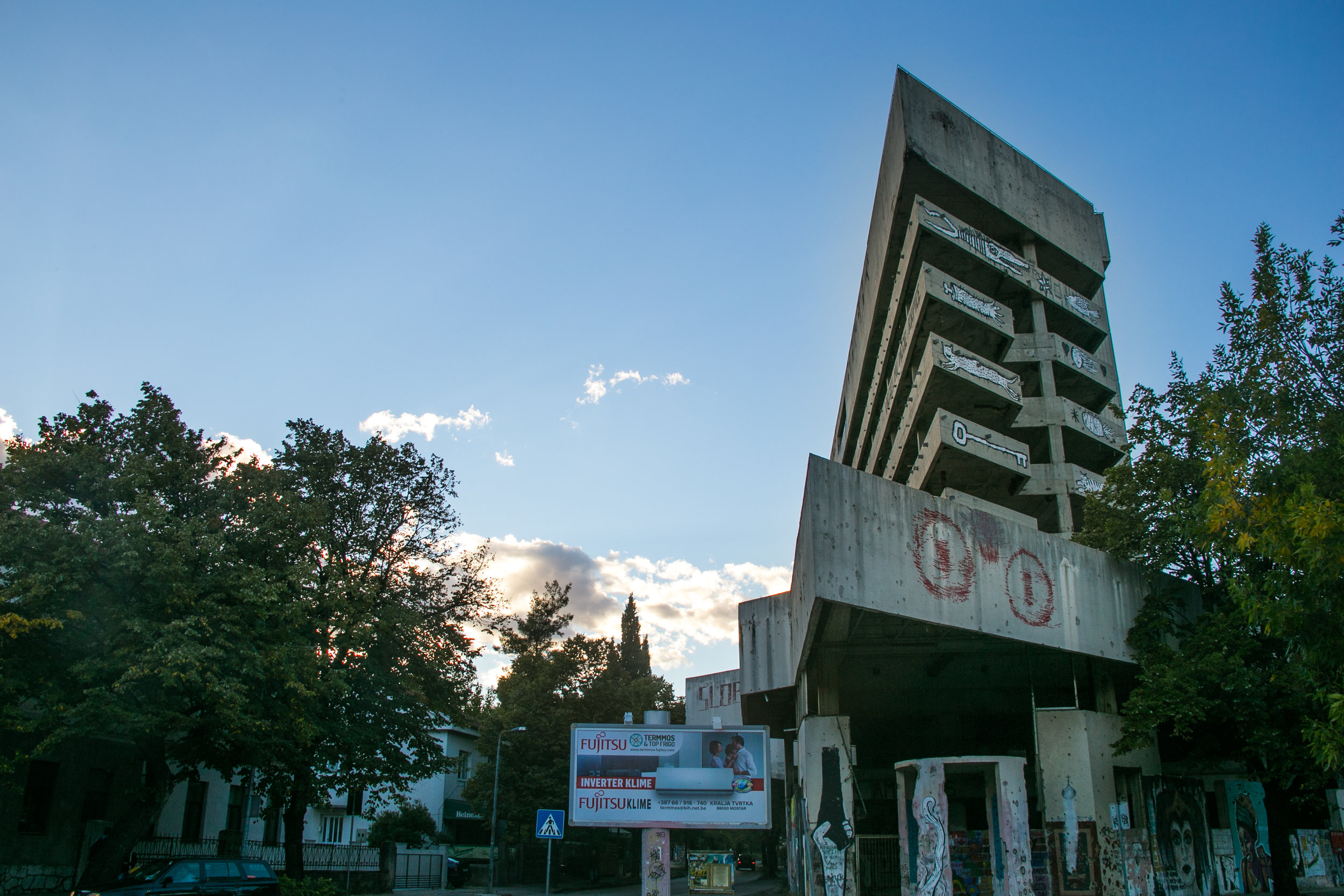  A condemned building still showing damages from the Bosnian War. This 10 story building was once a bank repurposed into a sniper tower during the defense of Mostar, Bosnia.&nbsp; The city served as a battle front between Croatian and Republic of Bos