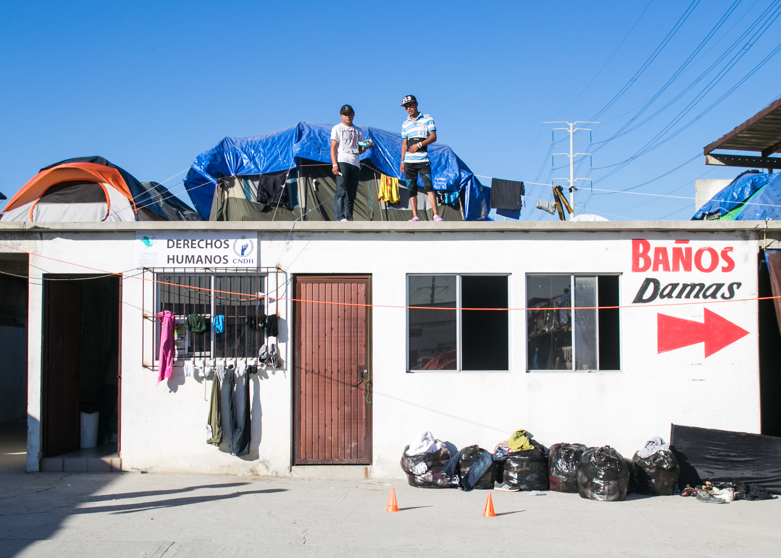  Tents are packed into every section (even on the rooftops) of the overcrowded Barretal refugee camp located outside of Tijuana, Mexico. 