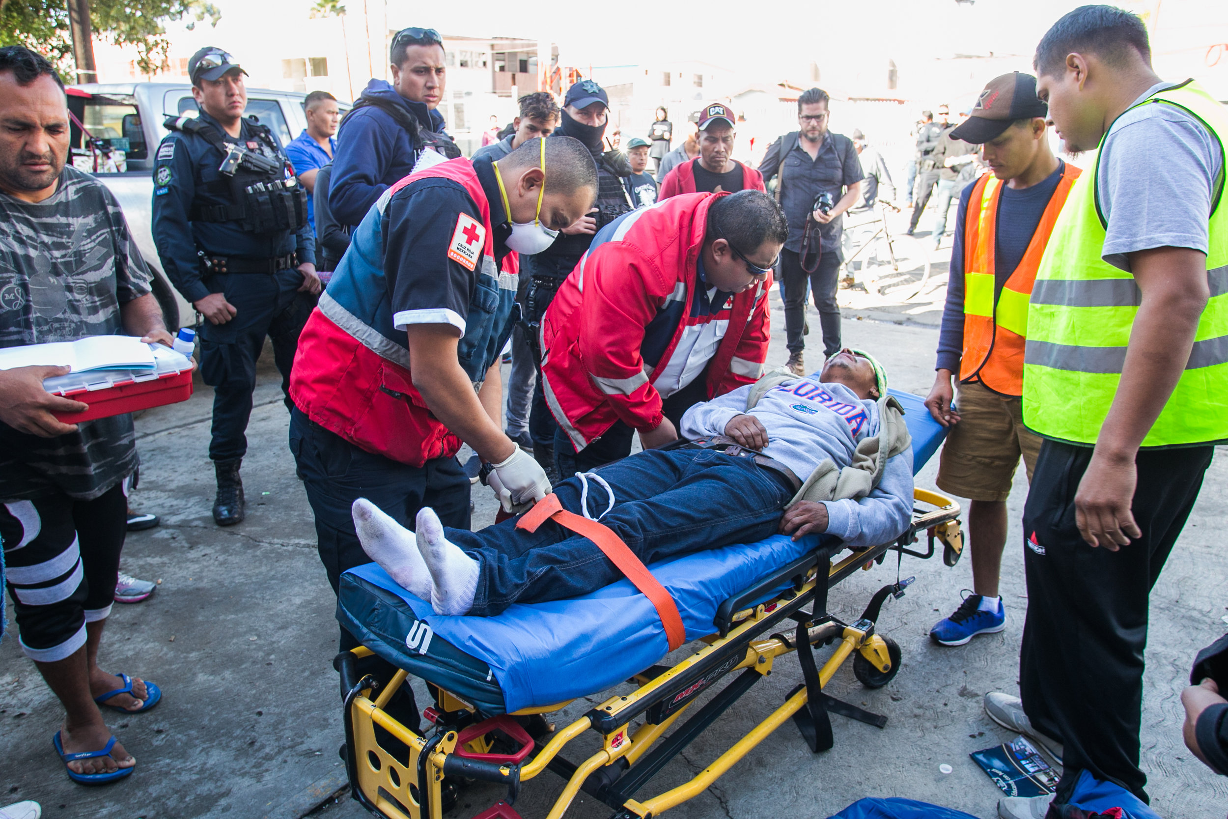  A man receives medical attention from emergency services after waiting for over 25 minutes. He began seizing and vomiting due to a lack of medication according to emergency responders on scene. Medical services were suspended in the facility several