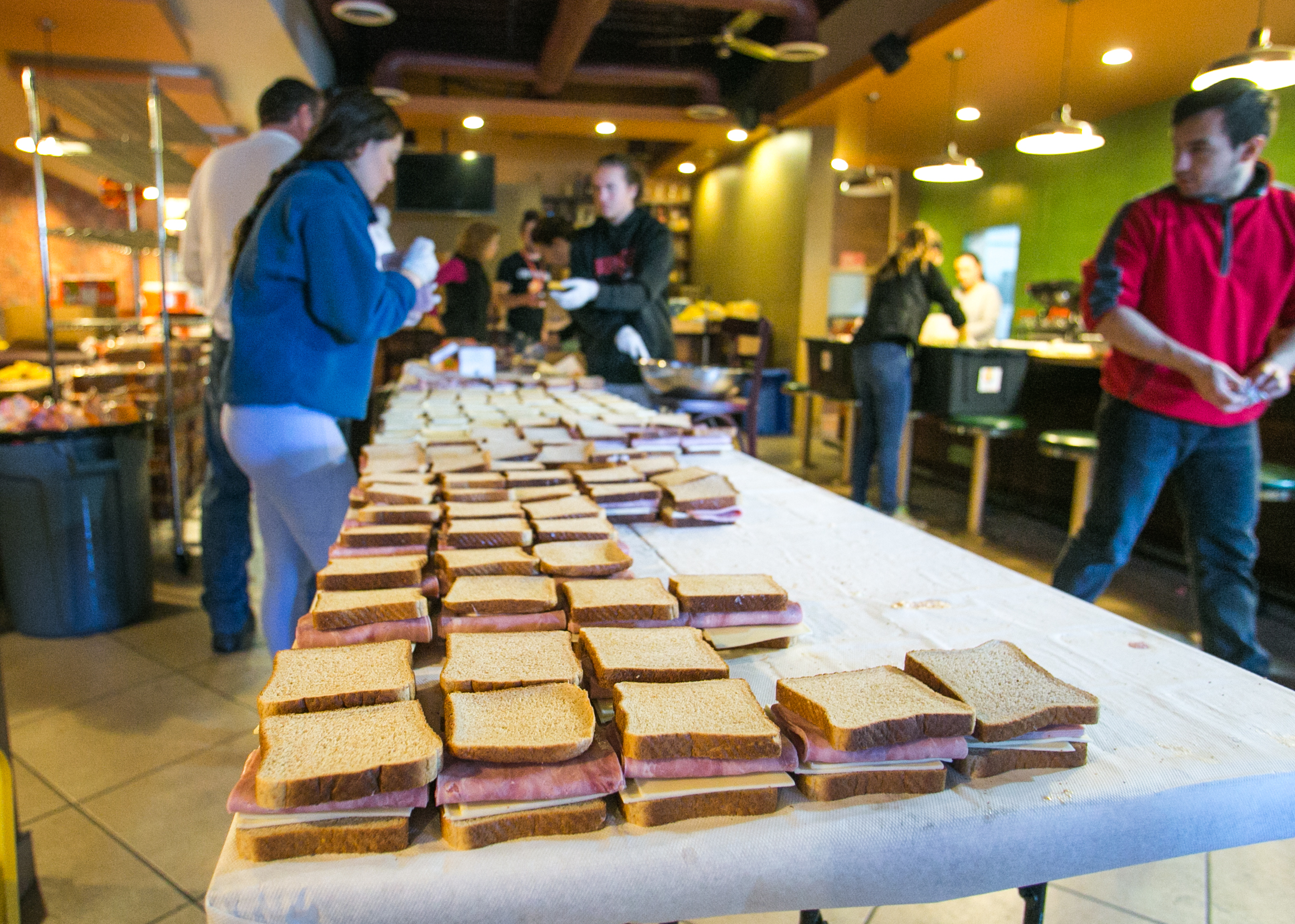  Over 1,200 sandwiches are prepped for lunch by World Central Kitchen volunteers. 