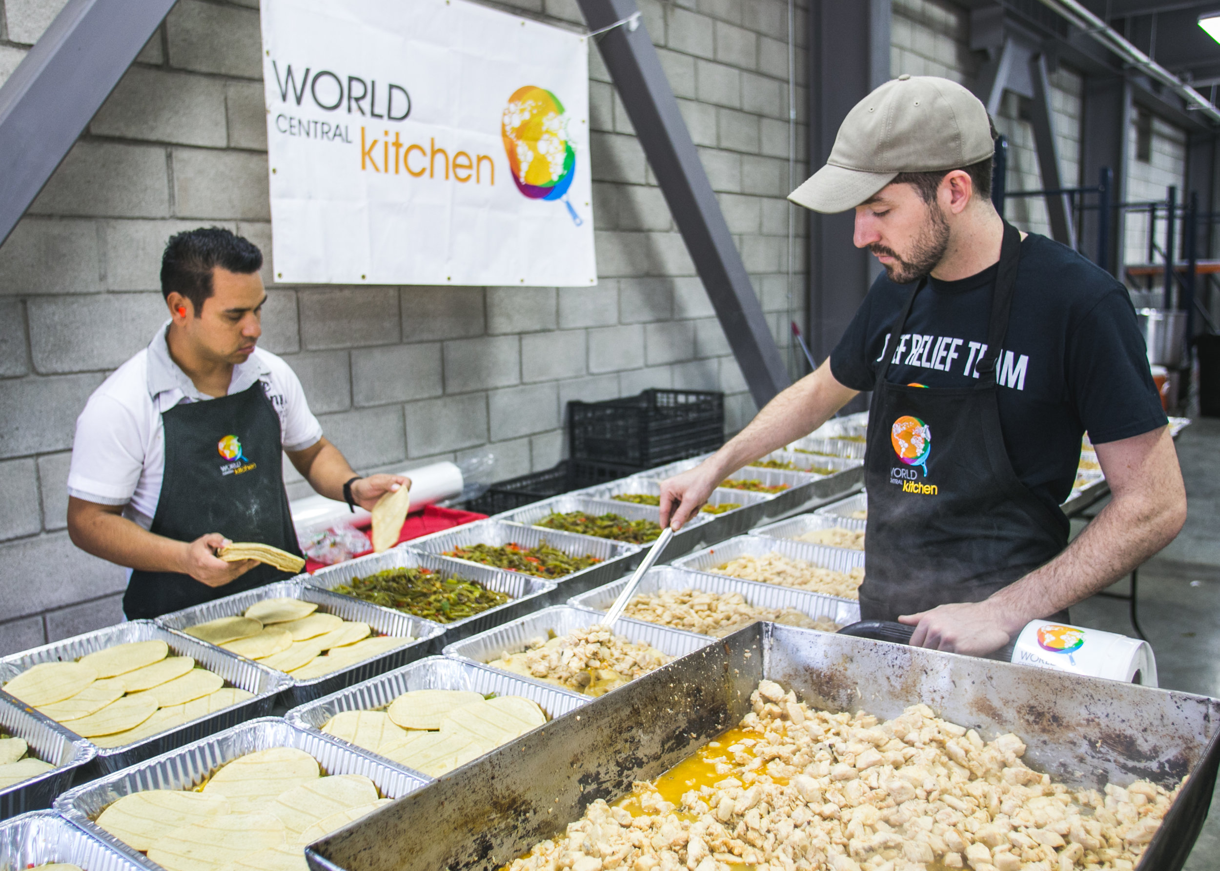  Brenden Darby, 28, of San Francisco cooks over 20 pounds of beef in the World Central Kitchen headquarters in Tijuana. The meat will be served as part of dish for dinner at the Barre Tal refugee camp. World Central Kitchen, Chef Jose Andres’ non-pro