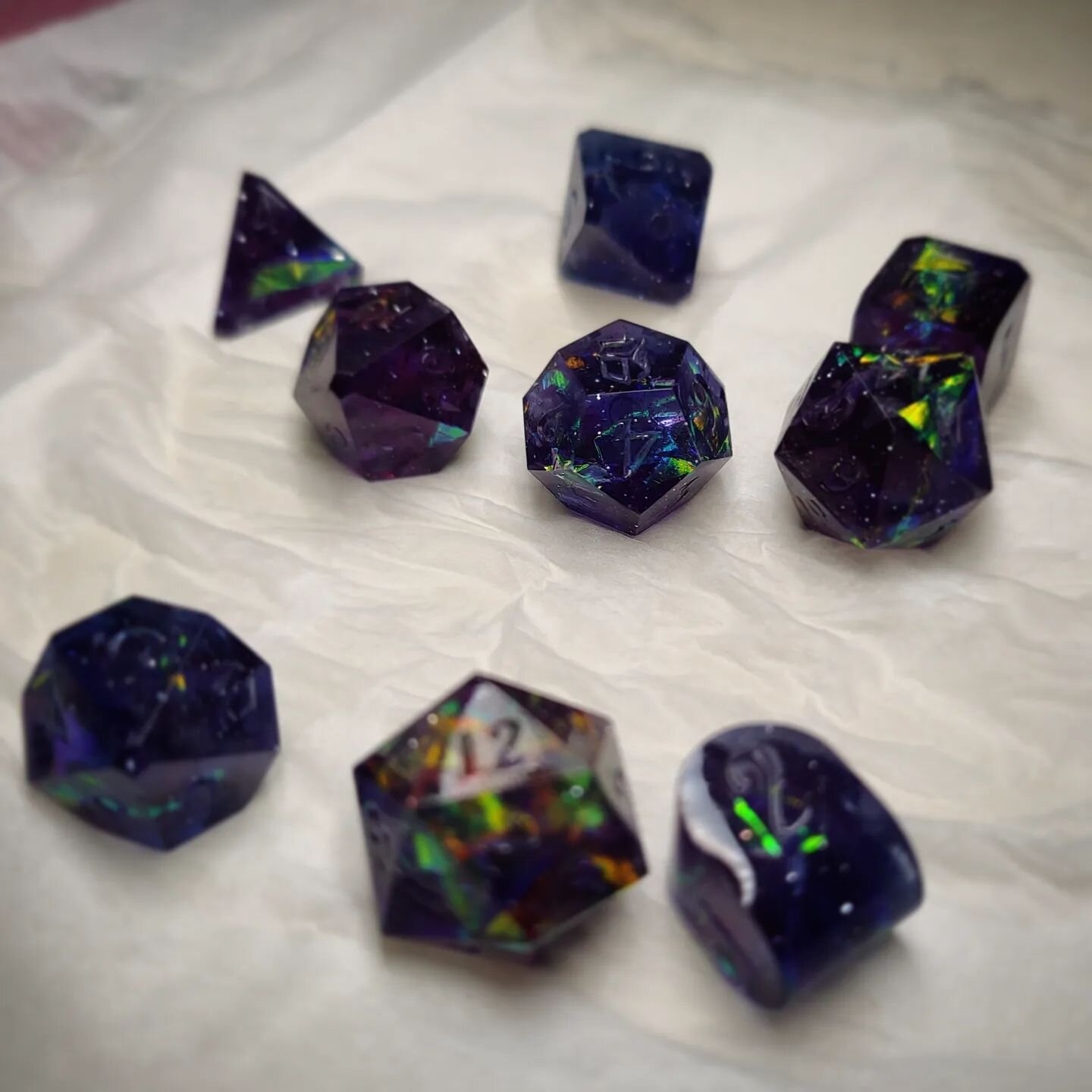 Hey folks!  Been on a bit of a break recently, my part-time job is keeping me busy, but I'm finally getting back to finishing some dice.  I've also been very busy in the workshop doing some much needed renovations!! 

Really pleased with how these di