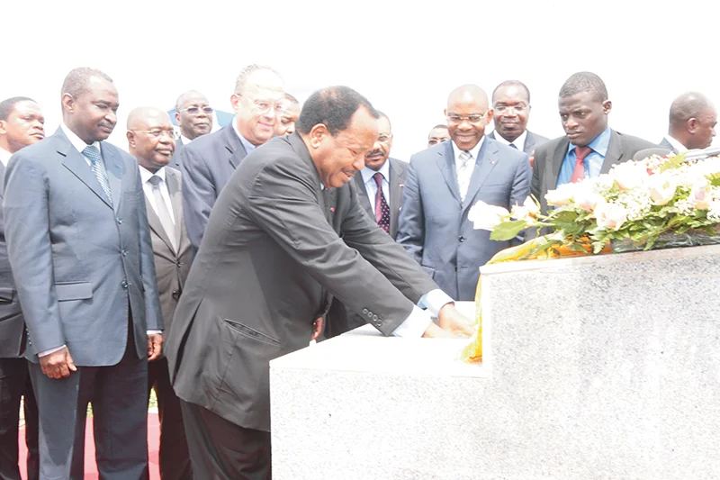The President of Cameroon, Paul Biya, lays a ceremonial first stone at the site of the Lom Pangar hydroelectric project (August 2012). Supplied
