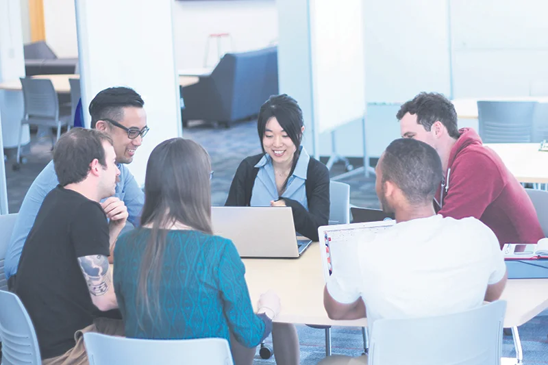 UBC Masters of Engineering Leadership students discuss case studies within their collaborative studio space. supplied