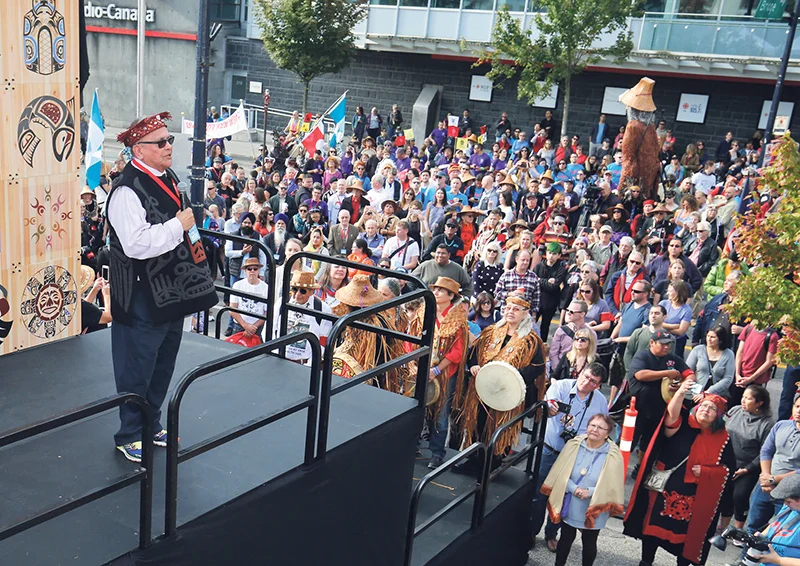 Chief Robert Joseph, Reconciliation Canada, addresses the crowd at the start of the 2017 Vancouver Walk for Reconciliation. supplied