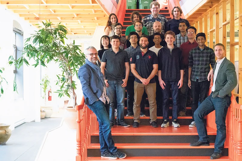 Yves Jacquier (left) and Derek Nowrouzezahrai (right) pictured with members of the McGill Graphics and Imaging Lab on location at Ubisoft, Montreal. Olivier Blouin