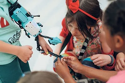 Translating AI Science to Solve Humanity’s Toughest Challenges 