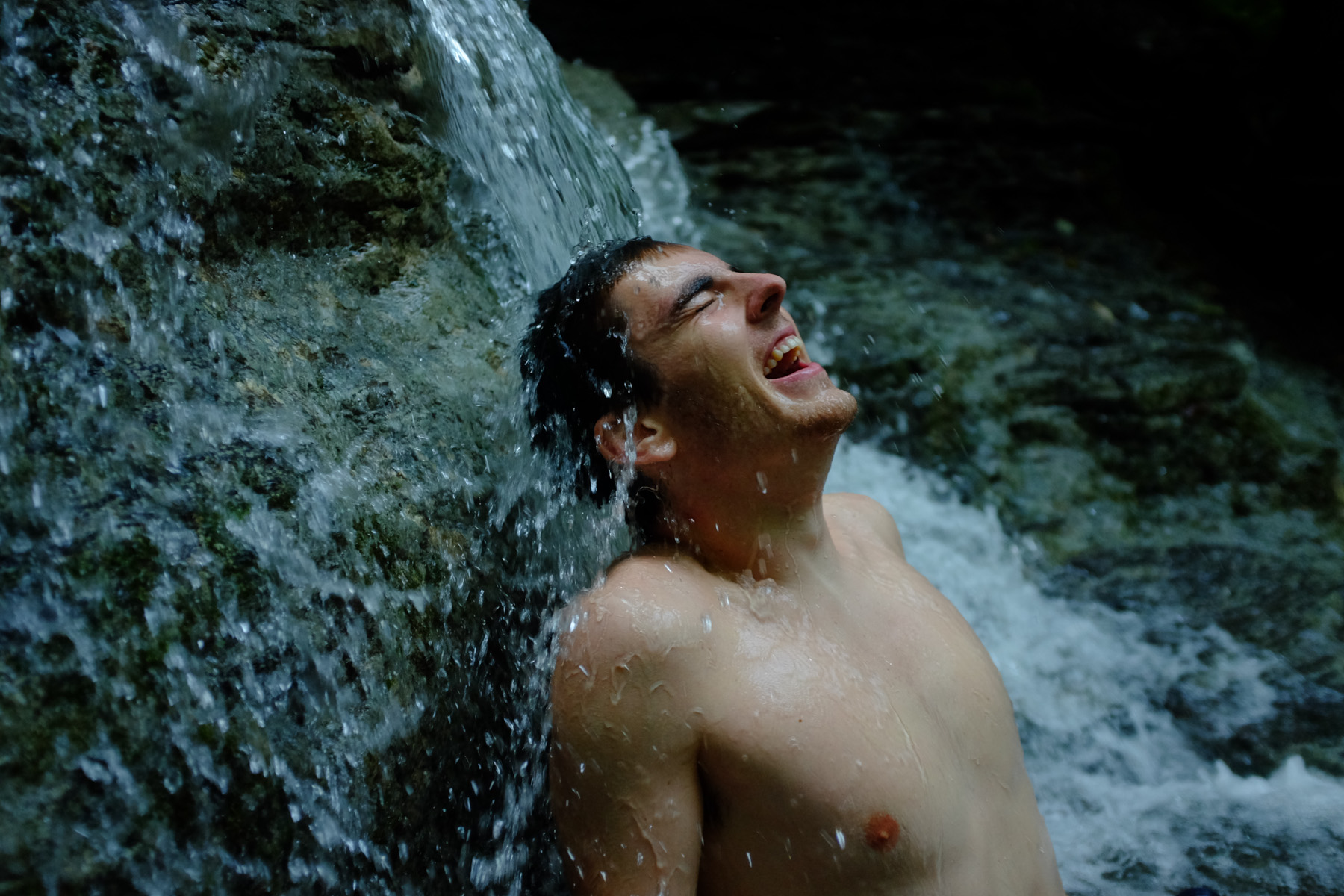 Wheeler Law tilts his head back into a waterfall to cool off at Grimes Glen in Naples, N.Y. when tempertures reached a high of 90 degrees. 