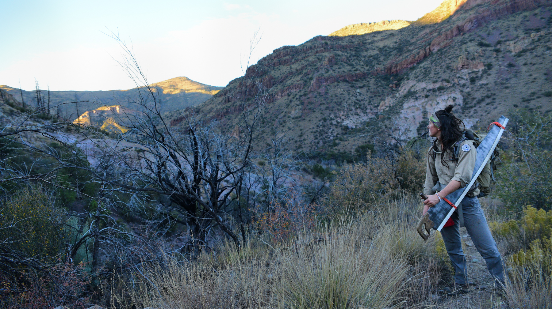 Emily Merlo, a crew leader with the American Conservation Experience looks over Gila National Forest while on an eight-day backcountry project Nov. 28th, 2017.