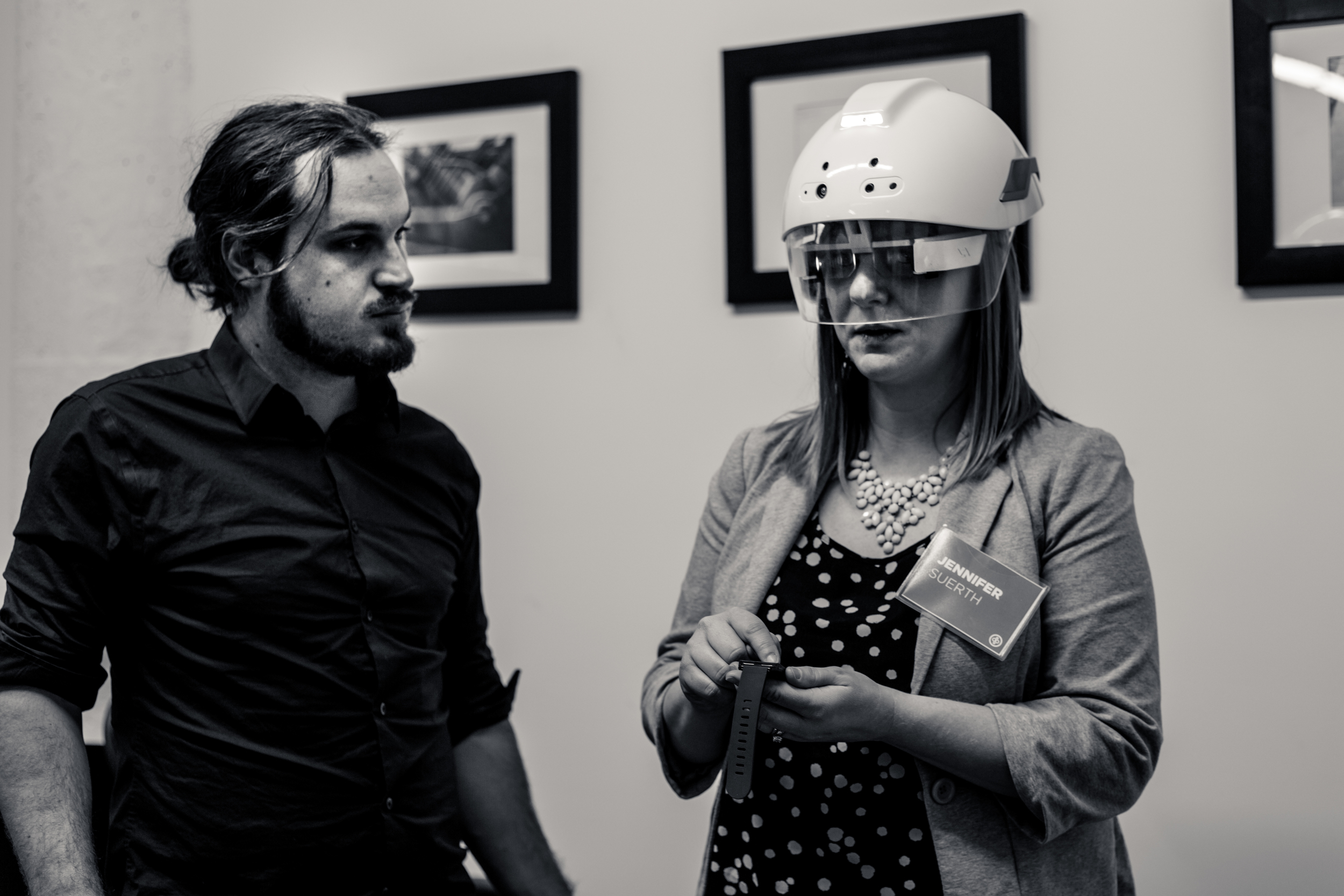  Jennifer Suerth (right), one of Mortenson's leading virtual managers in Chicago, tries out the DAQRI Smart Helmet. 