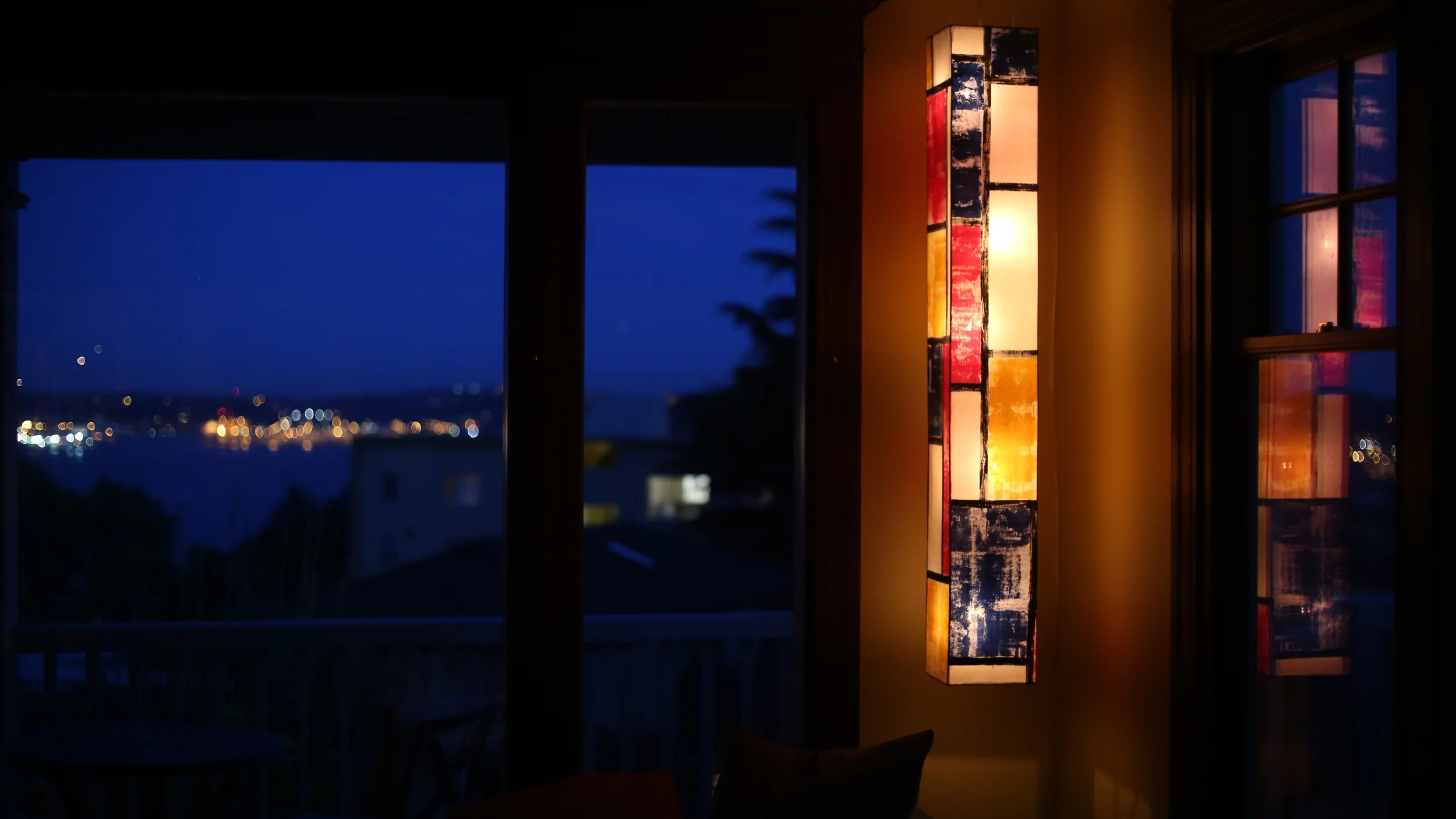  A Mondrian inspired hanging reading lamp. 