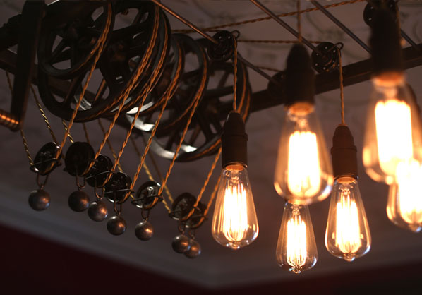 Building a light that had the ability to be able to move 'up and out of the way' was the main criteria for this dining light.