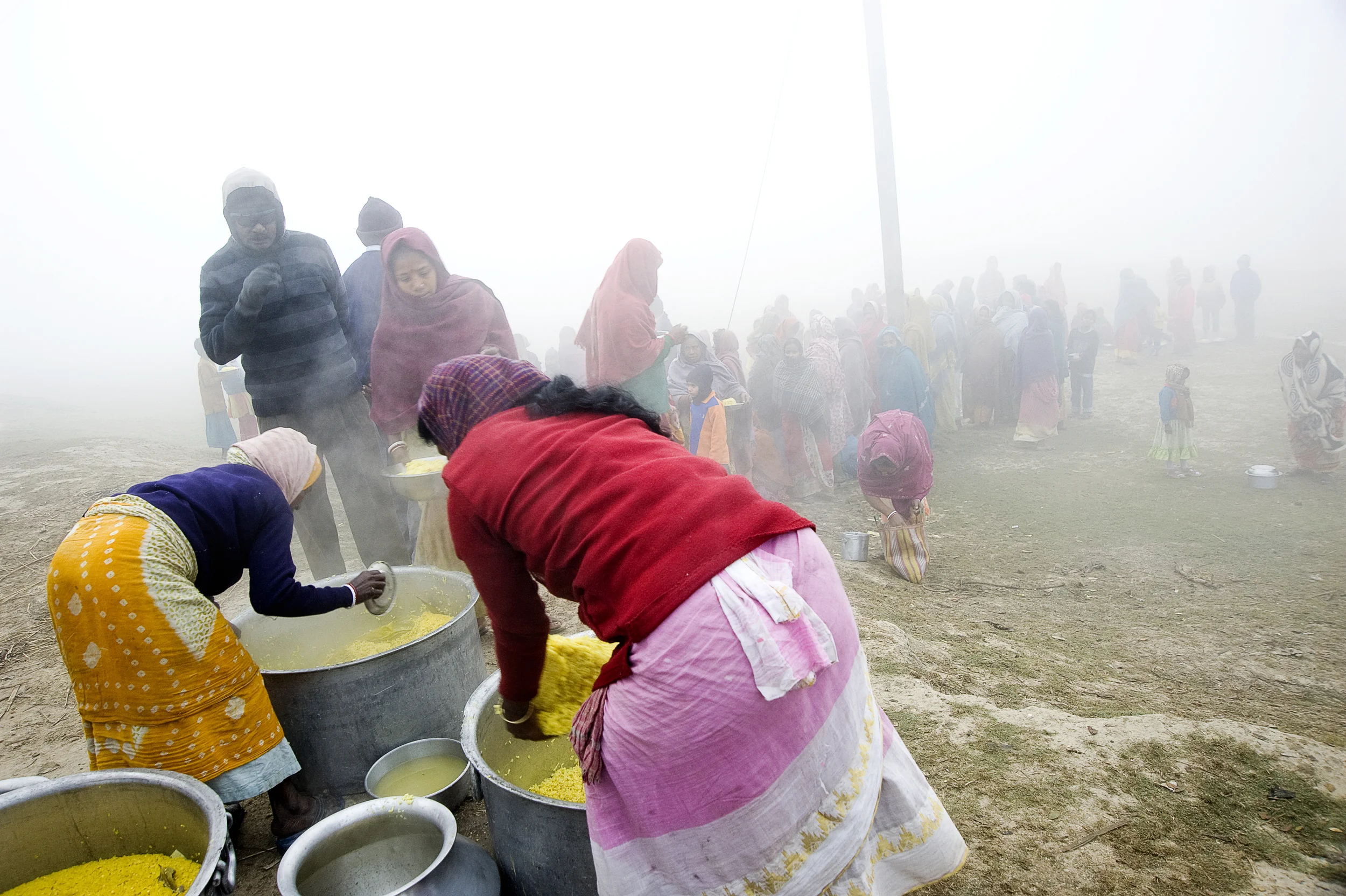 A hot meal of lentils, rice, and vegetables is available every morning at a nearby feeding line. Bring a pot to fill with food!