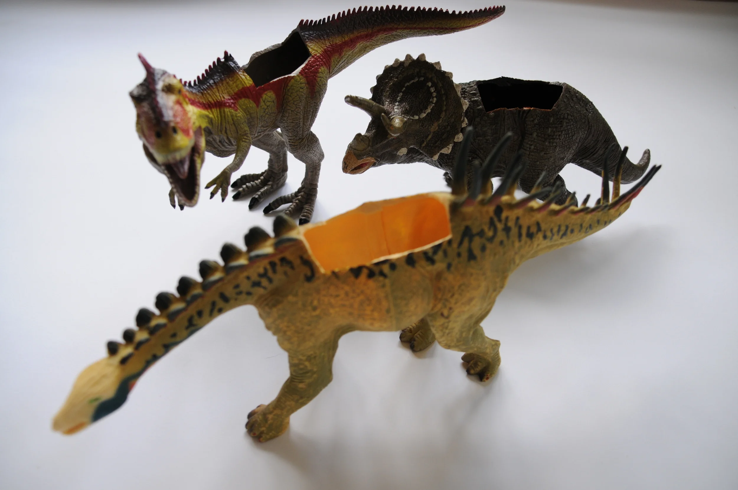 Cut out a hole on the back of the dinosaur