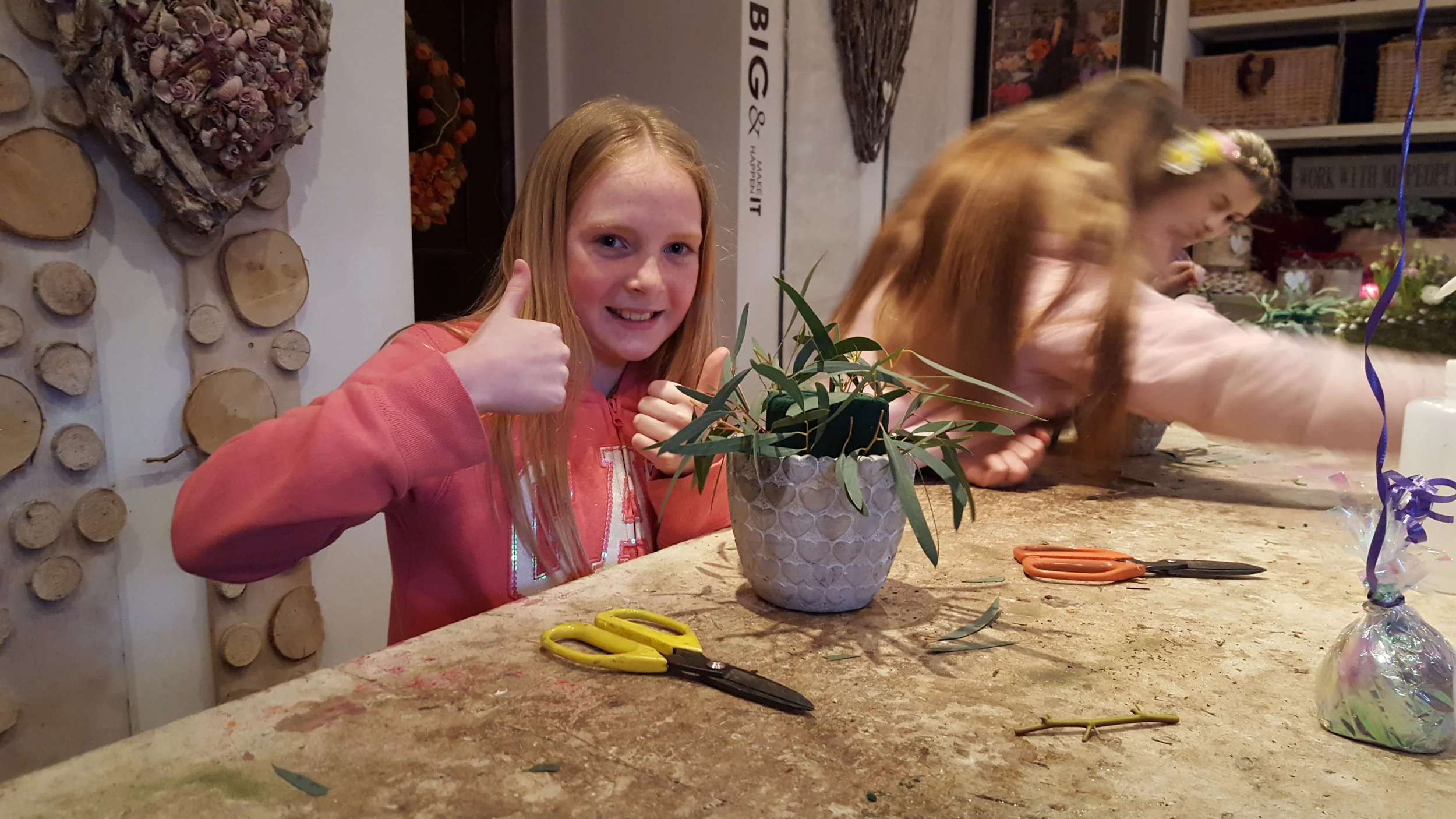 Adding foliage to the pots