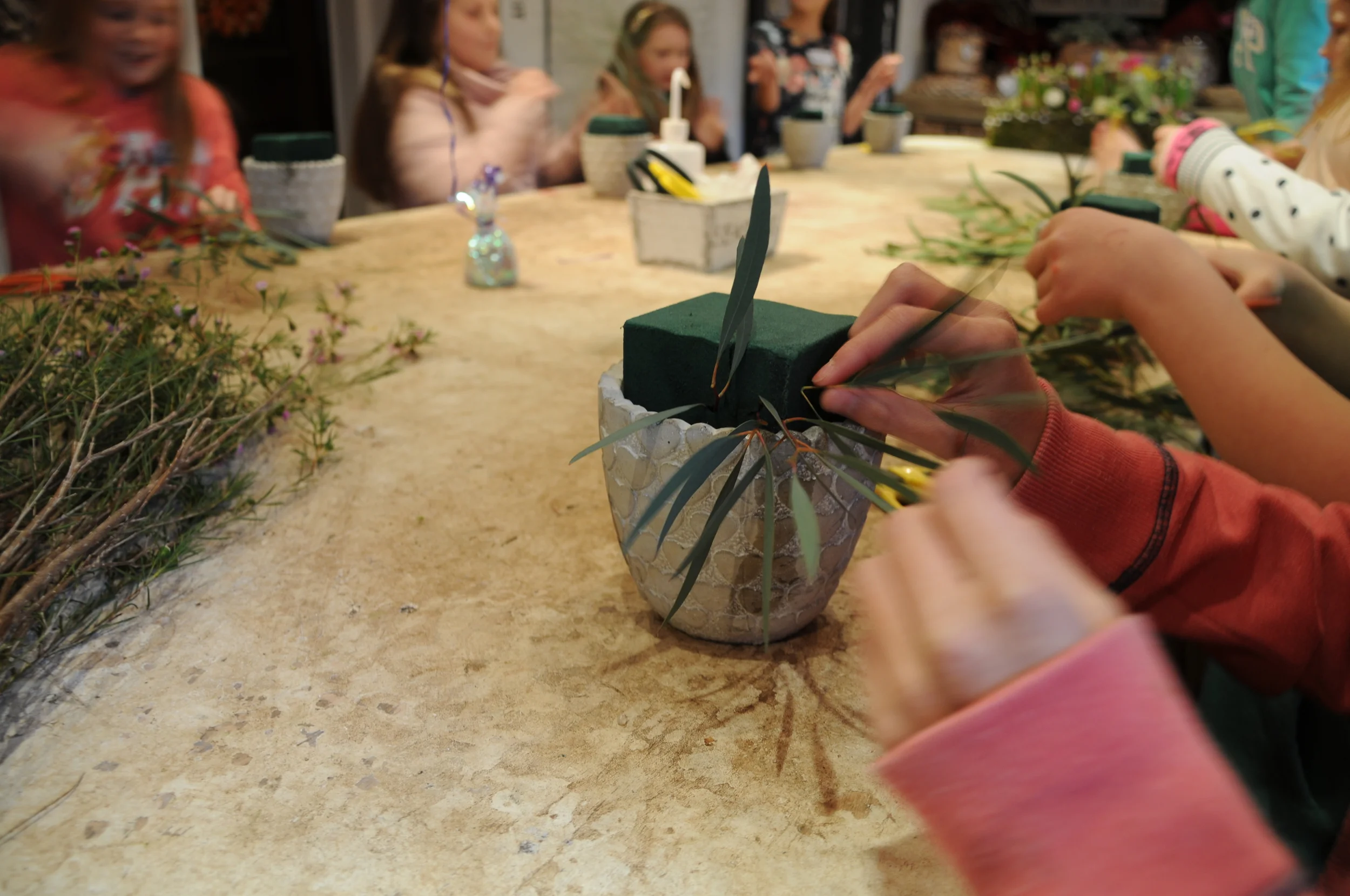 Adding foliage to the pots