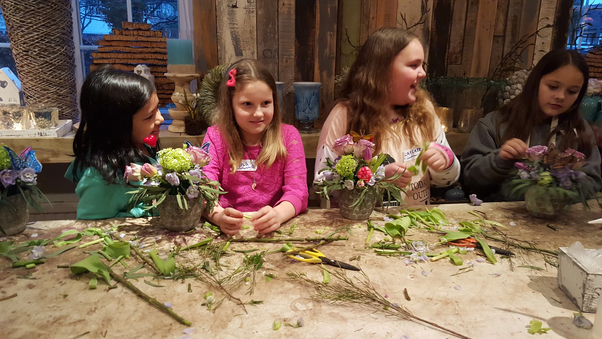 Adding flowers to the design. All in One Season Dutch floral party workshop
