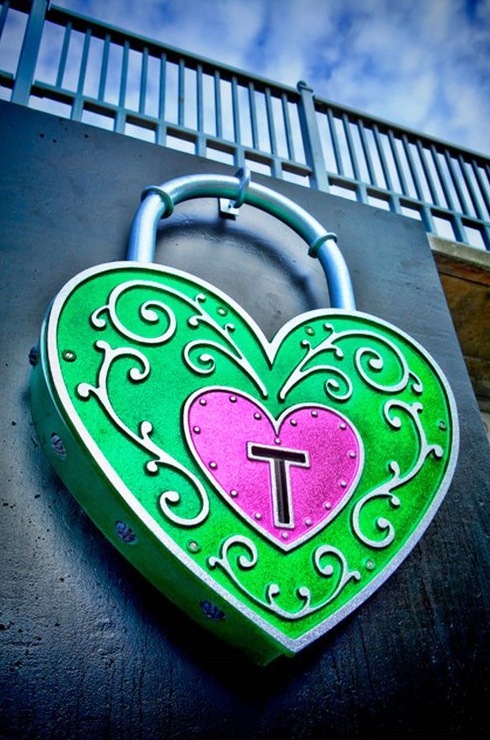 Detail of heart lock and 253 key. Cast Aluminum faceplates, steel frames, glass rivets, metal-flake auto enamel. Fabrication: Jennifer Weddermann. Paint: Ray Kirkoff.