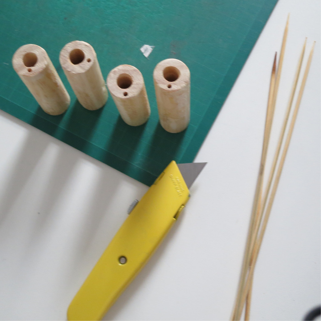 Broom handles and kebab sticks.