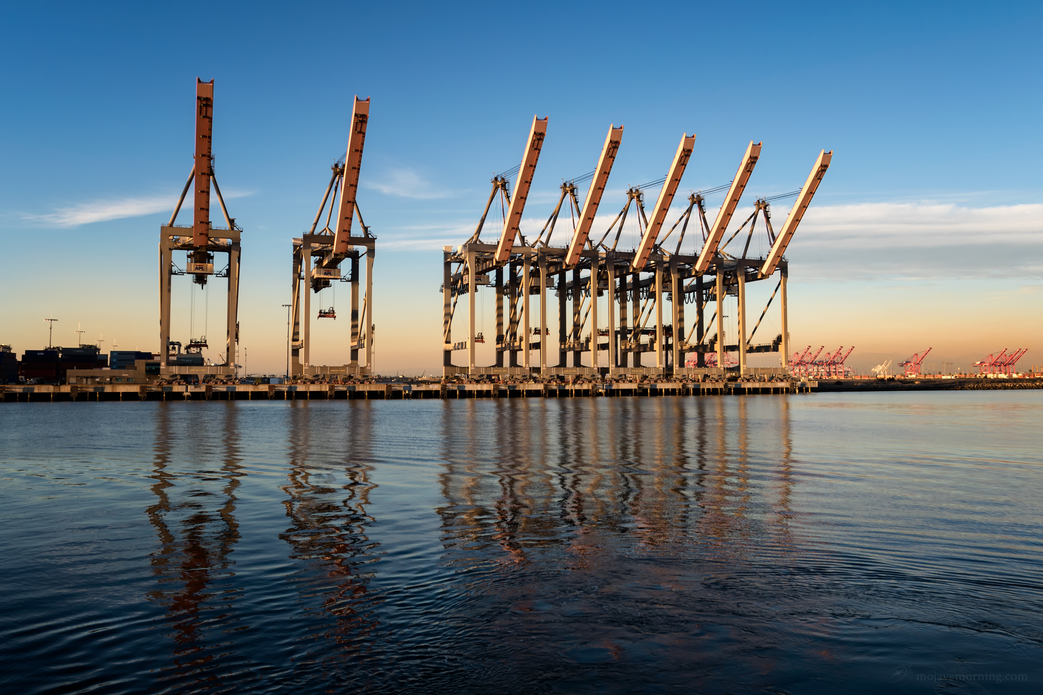 Cranes stand ready to unload the next cargo-laden ship.